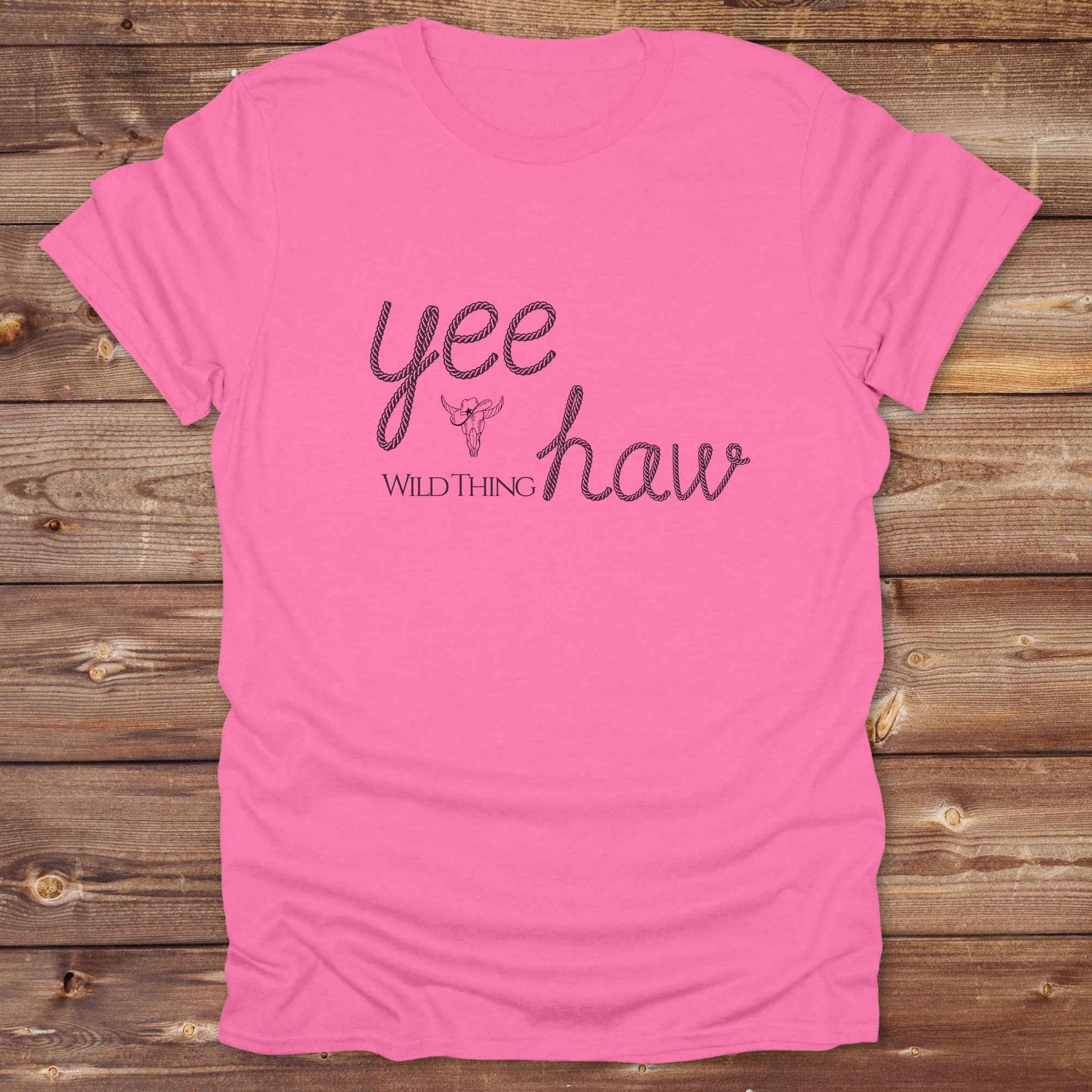 Fun western t-shirt for horse lovers and cowgirls. Western cowgirl graphic tee with horse design. Cowboy humor t-shirt for rodeo and country lovers. Horse lover funny t-shirt with western theme. Country style horse graphic tee for cowboys and cowgirls. Retro style funny western shirt for equestrians. Cute and funny country shirt with horse print. Southern cowgirl funny quote shirt for horse lovers. Yee Haw wild thing.