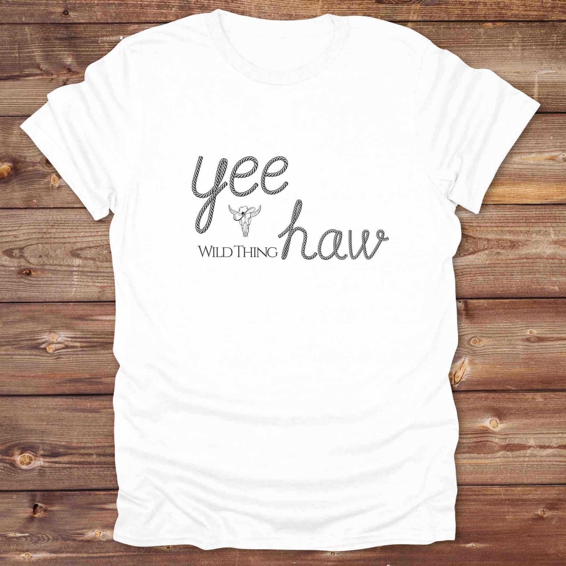 Fun western t-shirt for horse lovers and cowgirls. Western cowgirl graphic tee with horse design. Cowboy humor t-shirt for rodeo and country lovers. Horse lover funny t-shirt with western theme. Country style horse graphic tee for cowboys and cowgirls. Retro style funny western shirt for equestrians. Cute and funny country shirt with horse print. Southern cowgirl funny quote shirt for horse lovers. Yee Haw wild thing.