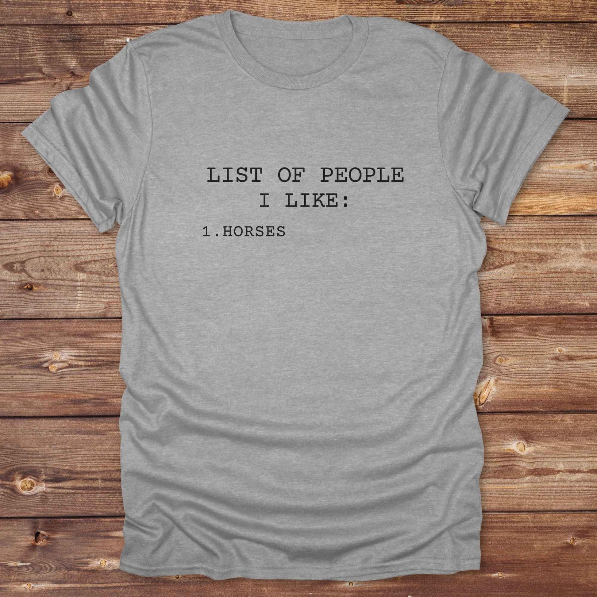 Fun western t-shirt for horse lovers and cowgirls. Western cowgirl graphic tee with horse design. Cowboy humor t-shirt for rodeo and country lovers. Horse lover funny t-shirt with western theme. Country style horse graphic tee for cowboys and cowgirls. Retro style funny western shirt for equestrians. Cute and funny country shirt with horse print. Southern cowgirl funny quote shirt for horse lovers. List of people I like, Horses.