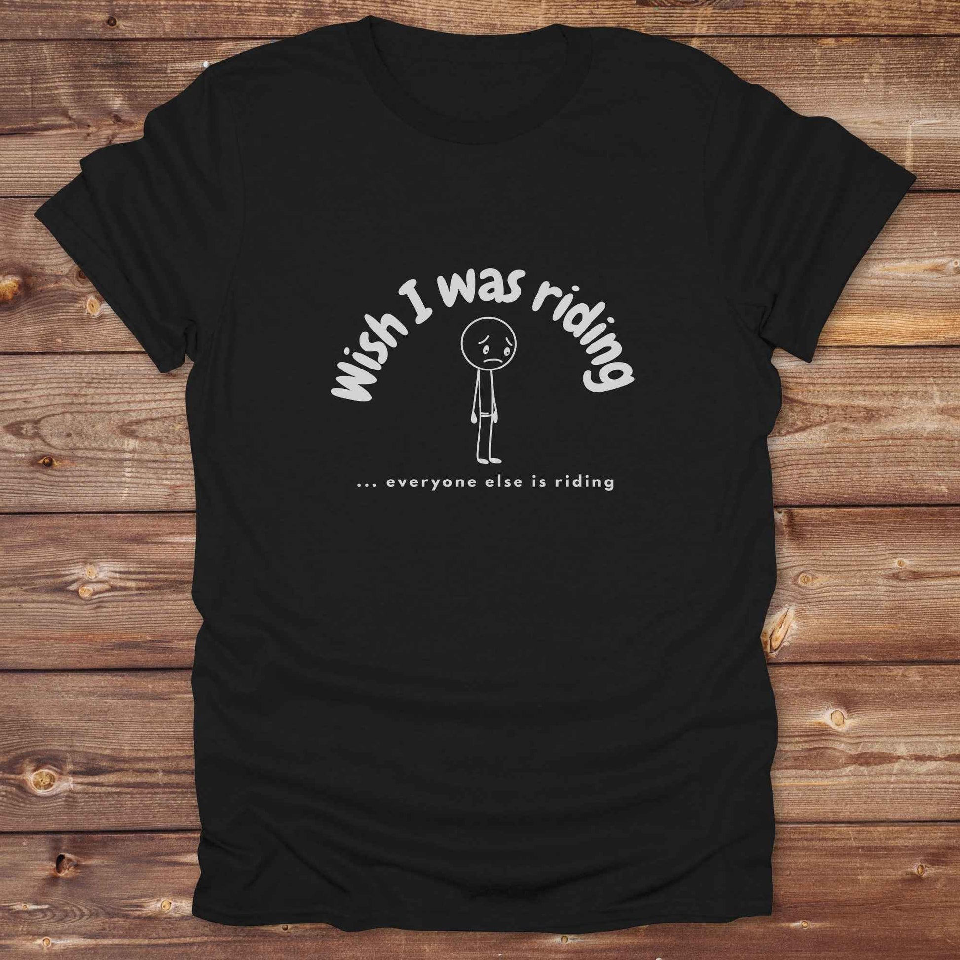 Fun western t-shirt for horse lovers and cowgirls. Western cowgirl graphic tee with horse design. Cowboy humor t-shirt for rodeo and country lovers. Horse lover funny t-shirt with western theme. Country style horse graphic tee for cowboys and cowgirls. Retro style funny western shirt for equestrians. Cute and funny country shirt with horse print. Southern cowgirl funny quote shirt for horse lovers. Wish I was riding everyone else is riding with sad person.