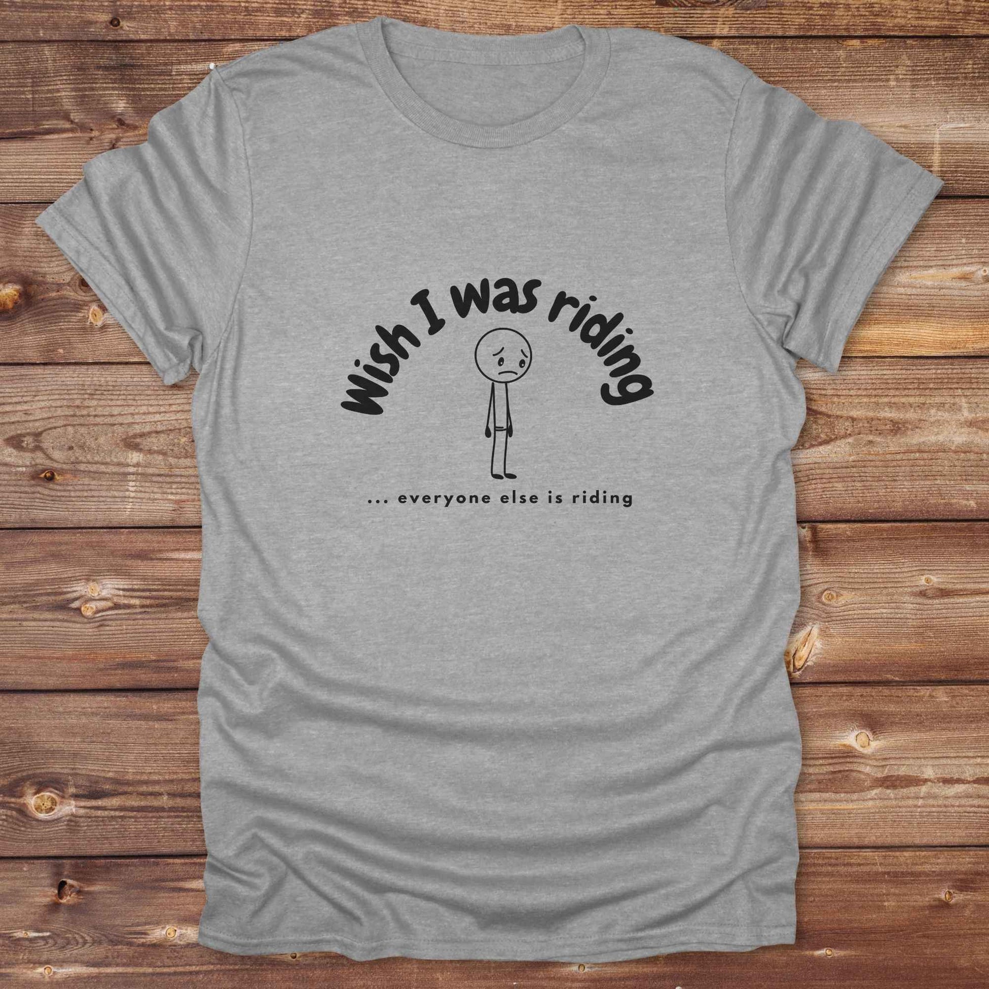 Fun western t-shirt for horse lovers and cowgirls. Western cowgirl graphic tee with horse design. Cowboy humor t-shirt for rodeo and country lovers. Horse lover funny t-shirt with western theme. Country style horse graphic tee for cowboys and cowgirls. Retro style funny western shirt for equestrians. Cute and funny country shirt with horse print. Southern cowgirl funny quote shirt for horse lovers. Wish I was riding everyone else is riding with sad person.