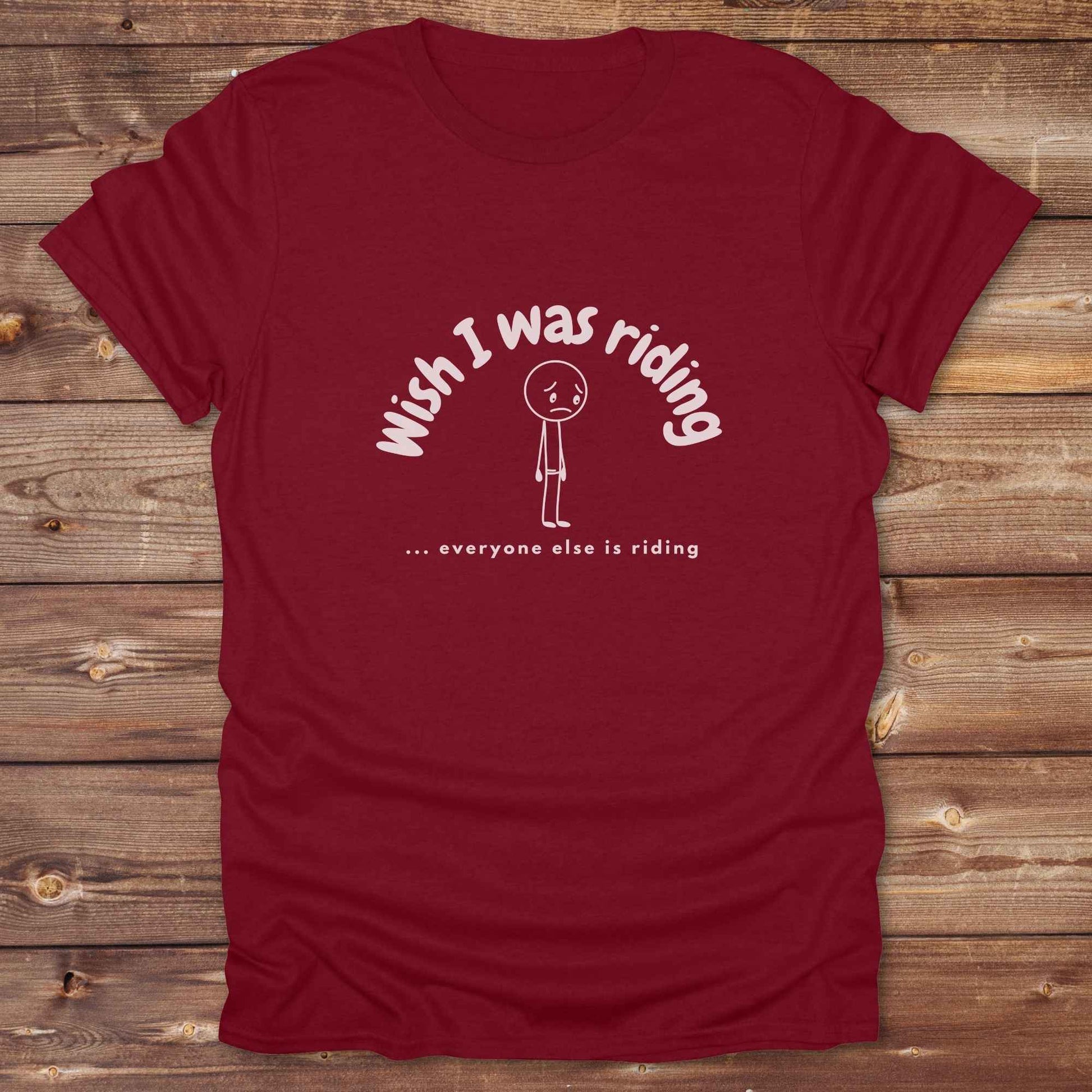 Fun western t-shirt for horse lovers and cowgirls. Western cowgirl graphic tee with horse design. Cowboy humor t-shirt for rodeo and country lovers. Horse lover funny t-shirt with western theme. Country style horse graphic tee for cowboys and cowgirls. Retro style funny western shirt for equestrians. Cute and funny country shirt with horse print. Southern cowgirl funny quote shirt for horse lovers. Wish I was riding everyone else is riding with sad person.