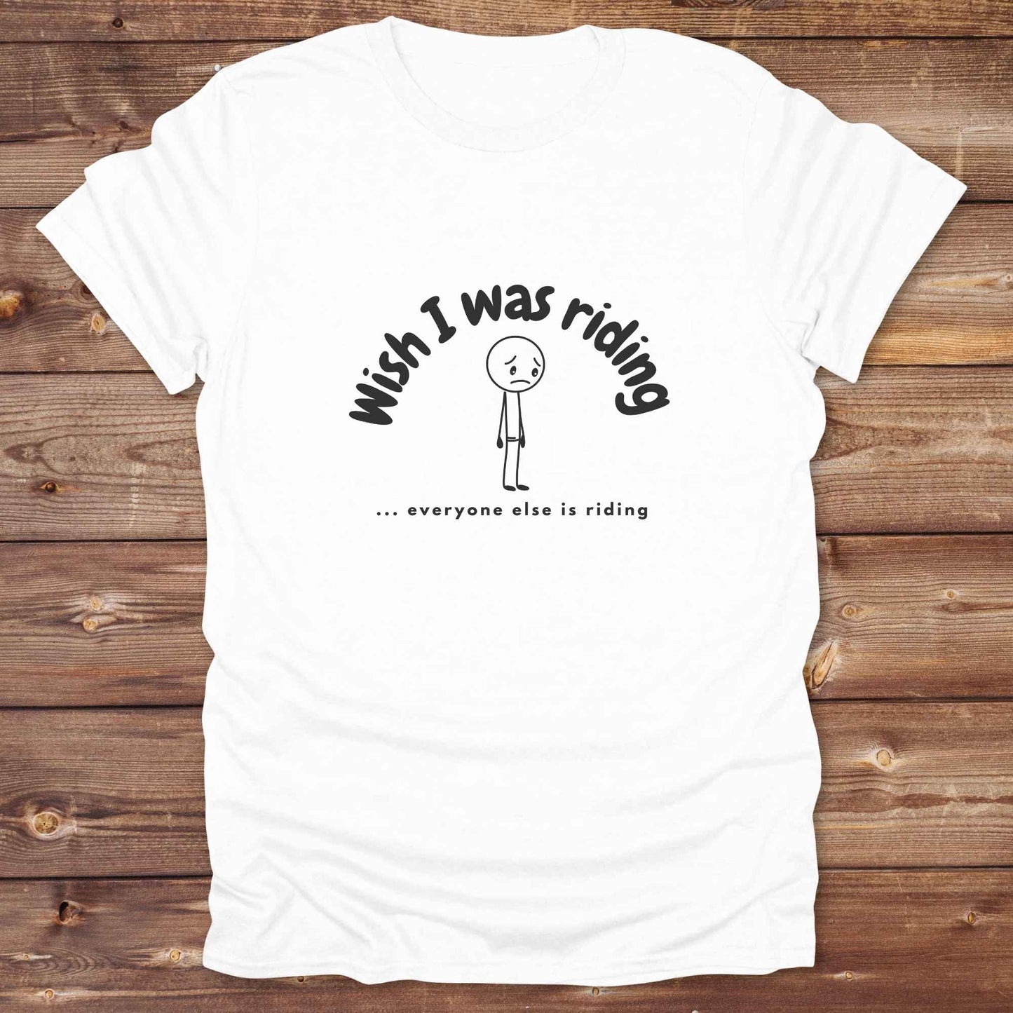 Fun western t-shirt for horse lovers and cowgirls. Western cowgirl graphic tee with horse design. Cowboy humor t-shirt for rodeo and country lovers. Horse lover funny t-shirt with western theme. Country style horse graphic tee for cowboys and cowgirls. Retro style funny western shirt for equestrians. Cute and funny country shirt with horse print. Southern cowgirl funny quote shirt for horse lovers. Wish I was riding everyone else is riding with sad person.