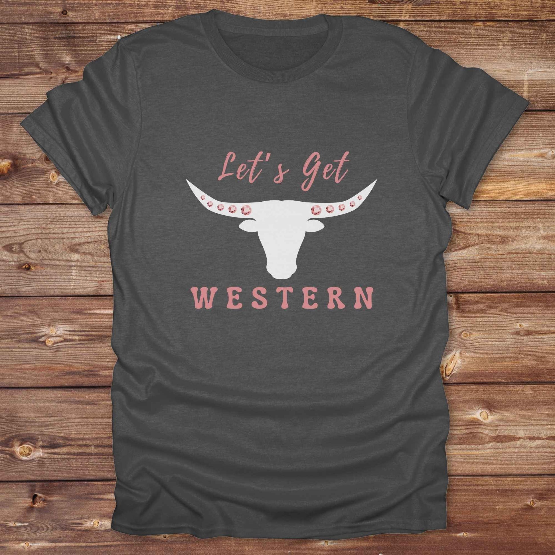 Fun western t-shirt for horse lovers and cowgirls. Western cowgirl graphic tee with horse design. Cowboy humor t-shirt for rodeo and country lovers. Horse lover funny t-shirt with western theme. Country style horse graphic tee for cowboys and cowgirls. Retro style funny western shirt for equestrians. Cute and funny country shirt with horse print. Southern cowgirl funny quote shirt for horse lovers. Lets get Western with longhorn skull and pink rhinestones.