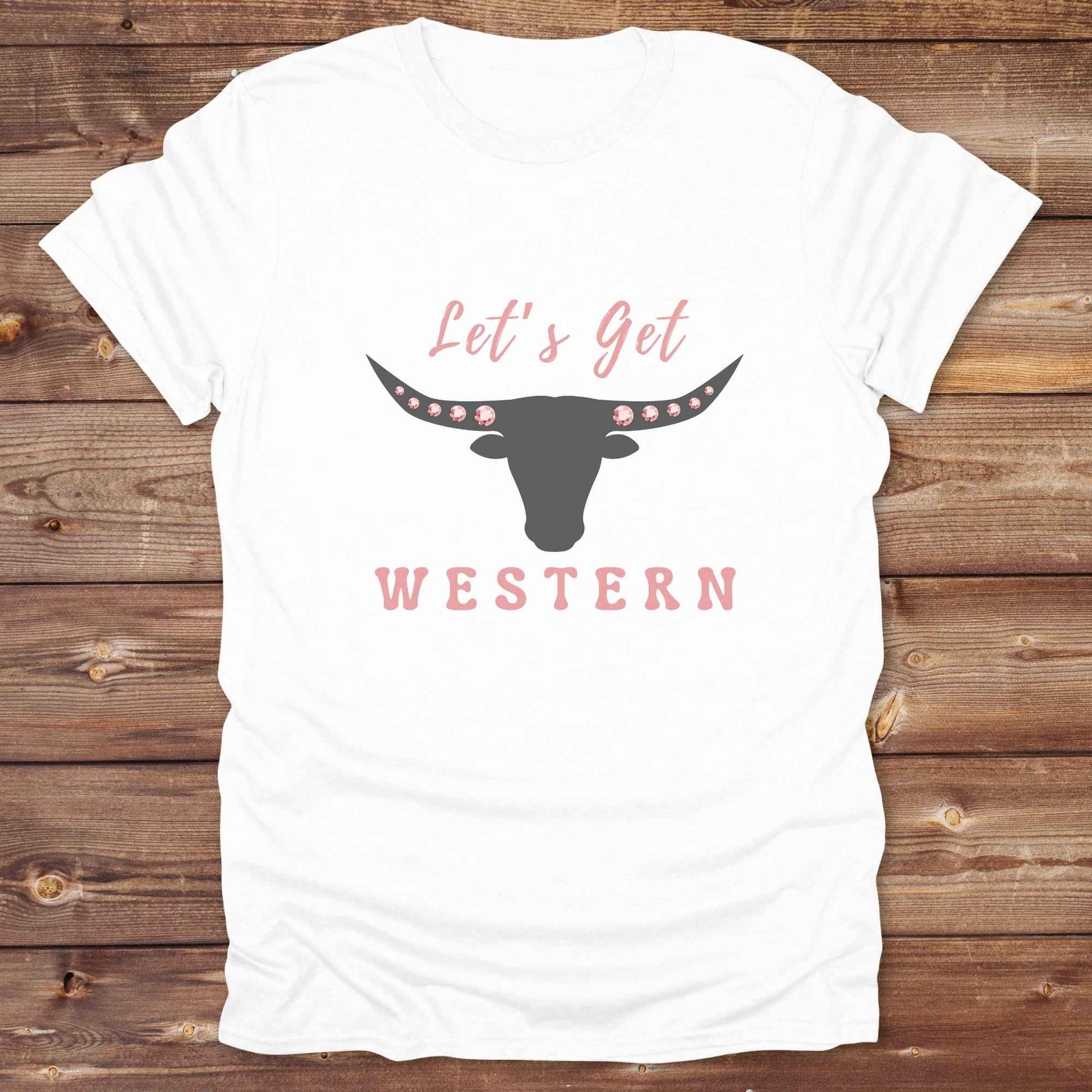 Fun western t-shirt for horse lovers and cowgirls. Western cowgirl graphic tee with horse design. Cowboy humor t-shirt for rodeo and country lovers. Horse lover funny t-shirt with western theme. Country style horse graphic tee for cowboys and cowgirls. Retro style funny western shirt for equestrians. Cute and funny country shirt with horse print. Southern cowgirl funny quote shirt for horse lovers. Lets get Western with longhorn skull and pink rhinestones.