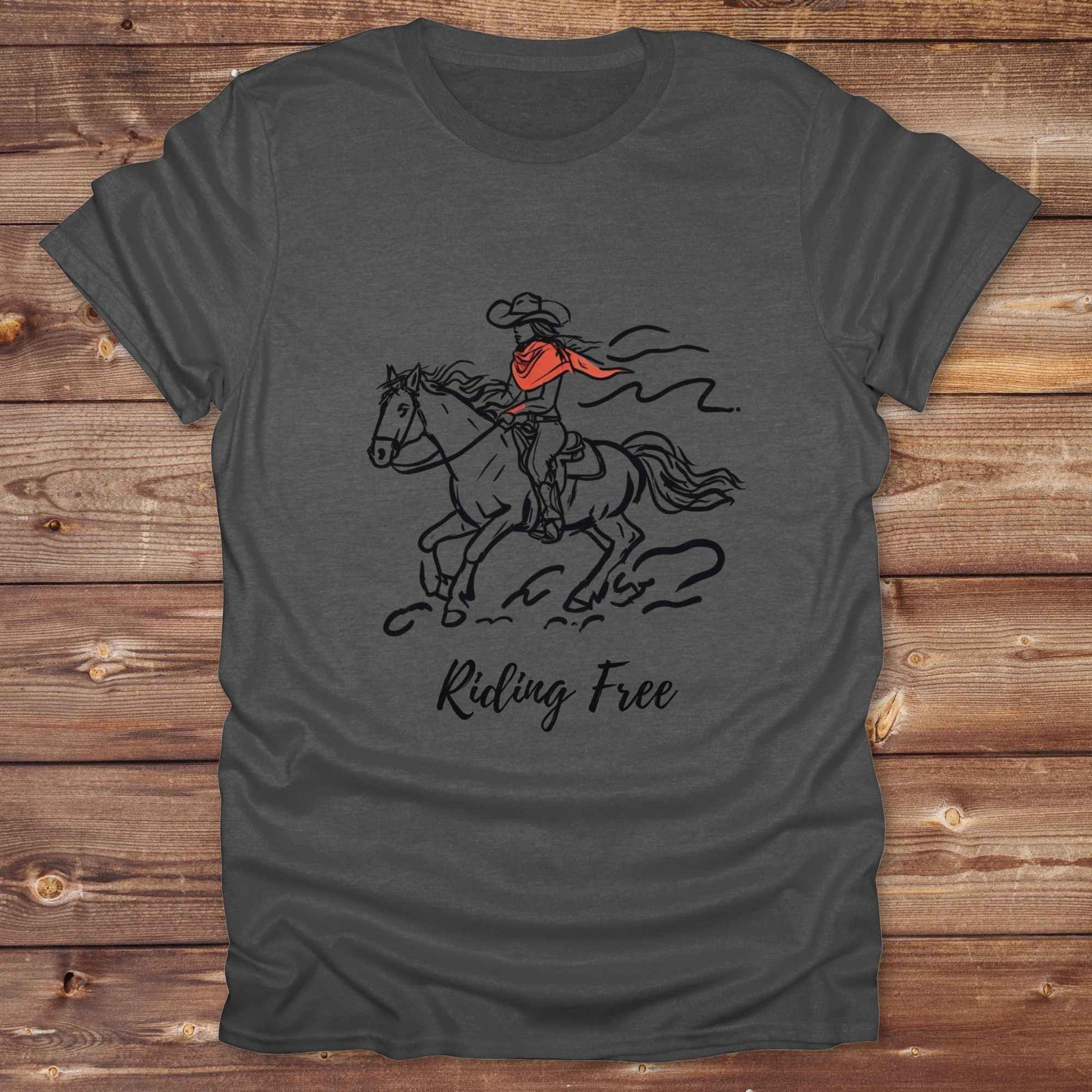 Fun western t-shirt for horse lovers and cowgirls. Western cowgirl graphic tee with horse design. Cowboy humor t-shirt for rodeo and country lovers. Horse lover funny t-shirt with western theme. Country style horse graphic tee for cowboys and cowgirls. Retro style funny western shirt for equestrians. Cute and funny country shirt with horse print. Southern cowgirl funny quote shirt for horse lovers. Riding Free.