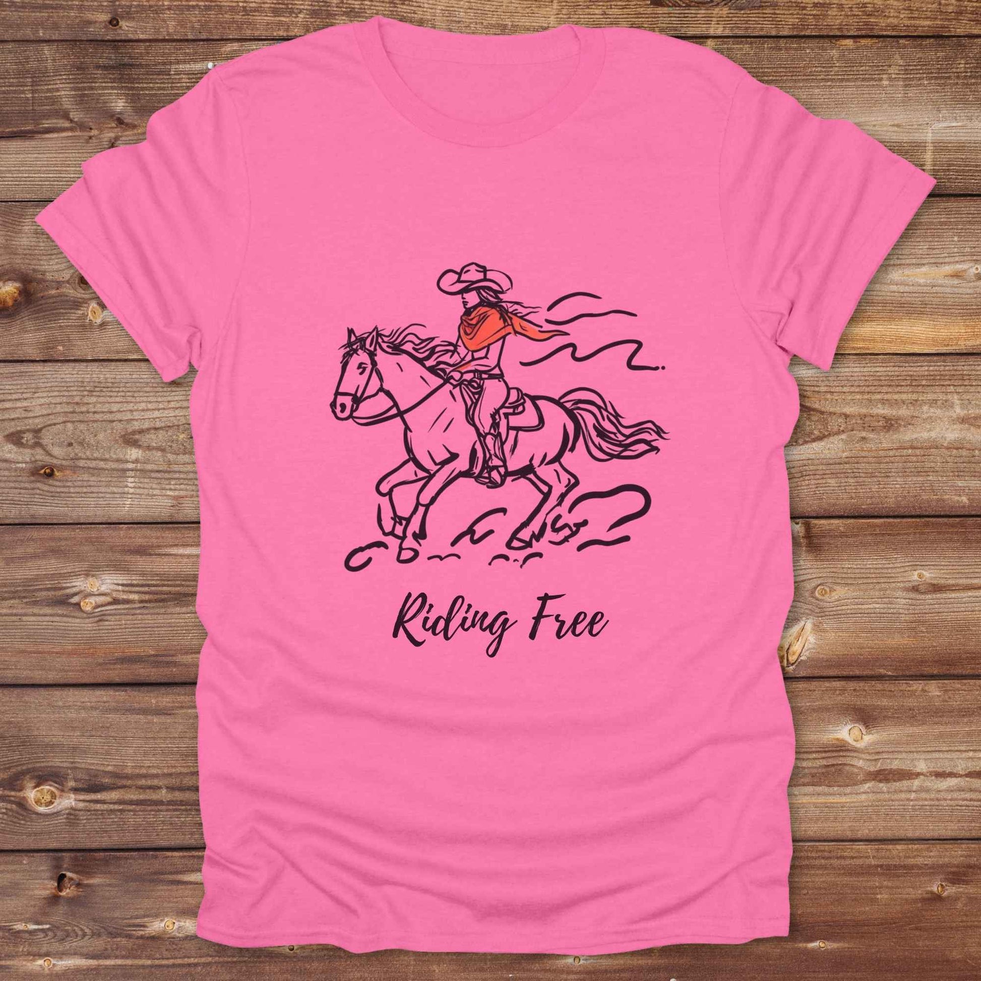 Fun western t-shirt for horse lovers and cowgirls. Western cowgirl graphic tee with horse design. Cowboy humor t-shirt for rodeo and country lovers. Horse lover funny t-shirt with western theme. Country style horse graphic tee for cowboys and cowgirls. Retro style funny western shirt for equestrians. Cute and funny country shirt with horse print. Southern cowgirl funny quote shirt for horse lovers. Riding Free.