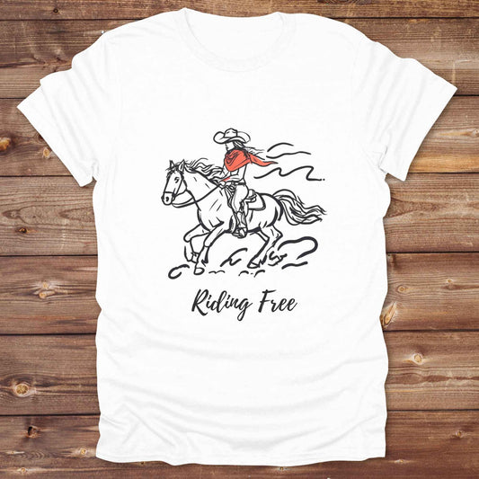 Fun western t-shirt for horse lovers and cowgirls. Western cowgirl graphic tee with horse design. Cowboy humor t-shirt for rodeo and country lovers. Horse lover funny t-shirt with western theme. Country style horse graphic tee for cowboys and cowgirls. Retro style funny western shirt for equestrians. Cute and funny country shirt with horse print. Southern cowgirl funny quote shirt for horse lovers. Riding Free.