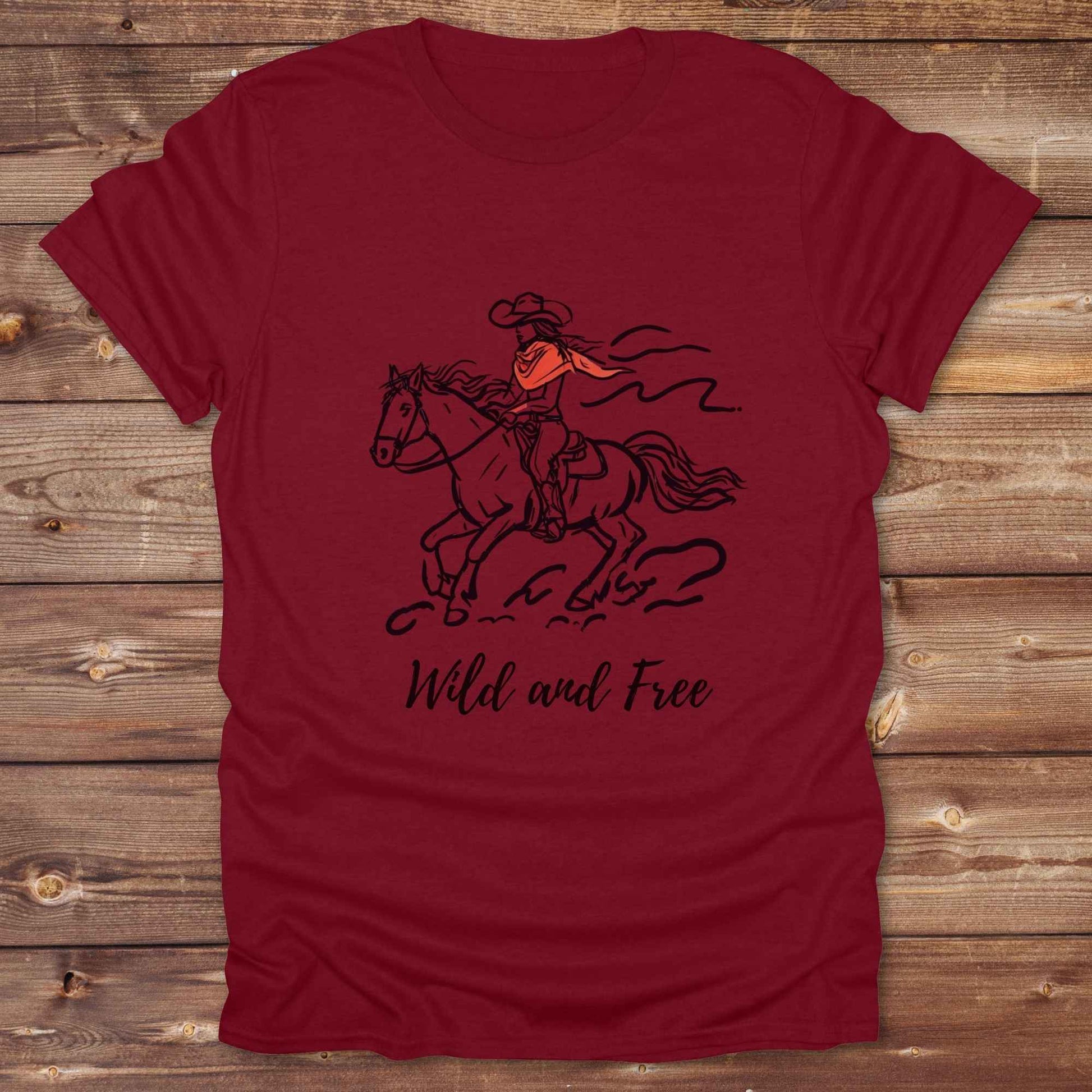 Fun western t-shirt for horse lovers and cowgirls. Western cowgirl graphic tee with horse design. Cowboy humor t-shirt for rodeo and country lovers. Horse lover funny t-shirt with western theme. Country style horse graphic tee for cowboys and cowgirls. Retro style funny western shirt for equestrians. Cute and funny country shirt with horse print. Southern cowgirl funny quote shirt for horse lovers. Wild and Free.