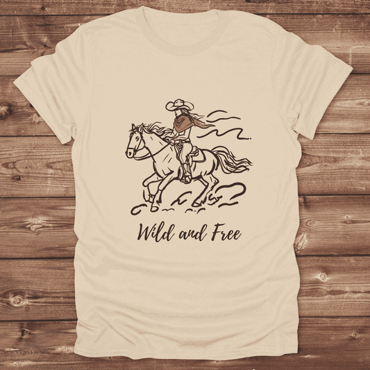 Fun western t-shirt for horse lovers and cowgirls. Western cowgirl graphic tee with horse design. Cowboy humor t-shirt for rodeo and country lovers. Horse lover funny t-shirt with western theme. Country style horse graphic tee for cowboys and cowgirls. Retro style funny western shirt for equestrians. Cute and funny country shirt with horse print. Southern cowgirl funny quote shirt for horse lovers. Wild and Free.