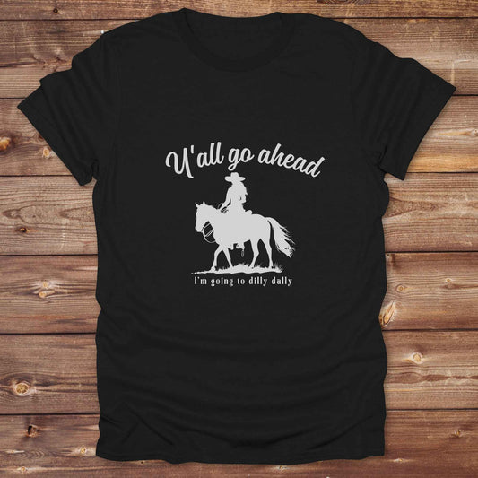 Fun western t-shirt for horse lovers and cowgirls. Western cowgirl graphic tee with horse design. Cowboy humor t-shirt for rodeo and country lovers. Horse lover funny t-shirt with western theme. Country style horse graphic tee for cowboys and cowgirls. Retro style funny western shirt for equestrians. Cute and funny country shirt with horse print. Southern cowgirl funny quote shirt for horse lovers. If Y'all go ahead.