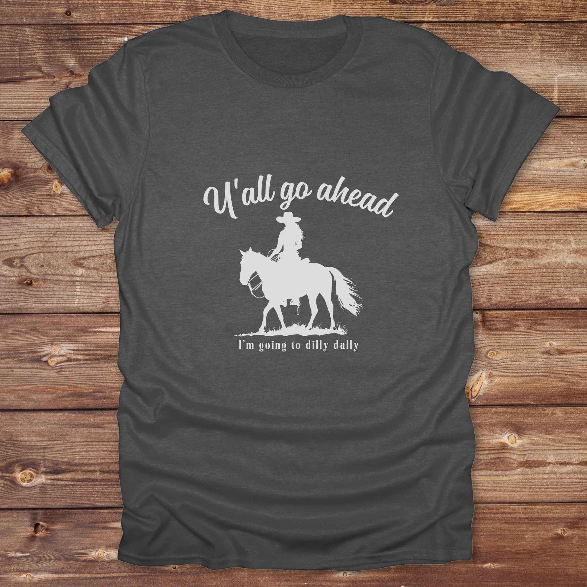 Fun western t-shirt for horse lovers and cowgirls. Western cowgirl graphic tee with horse design. Cowboy humor t-shirt for rodeo and country lovers. Horse lover funny t-shirt with western theme. Country style horse graphic tee for cowboys and cowgirls. Retro style funny western shirt for equestrians. Cute and funny country shirt with horse print. Southern cowgirl funny quote shirt for horse lovers. If Y'all go ahead.