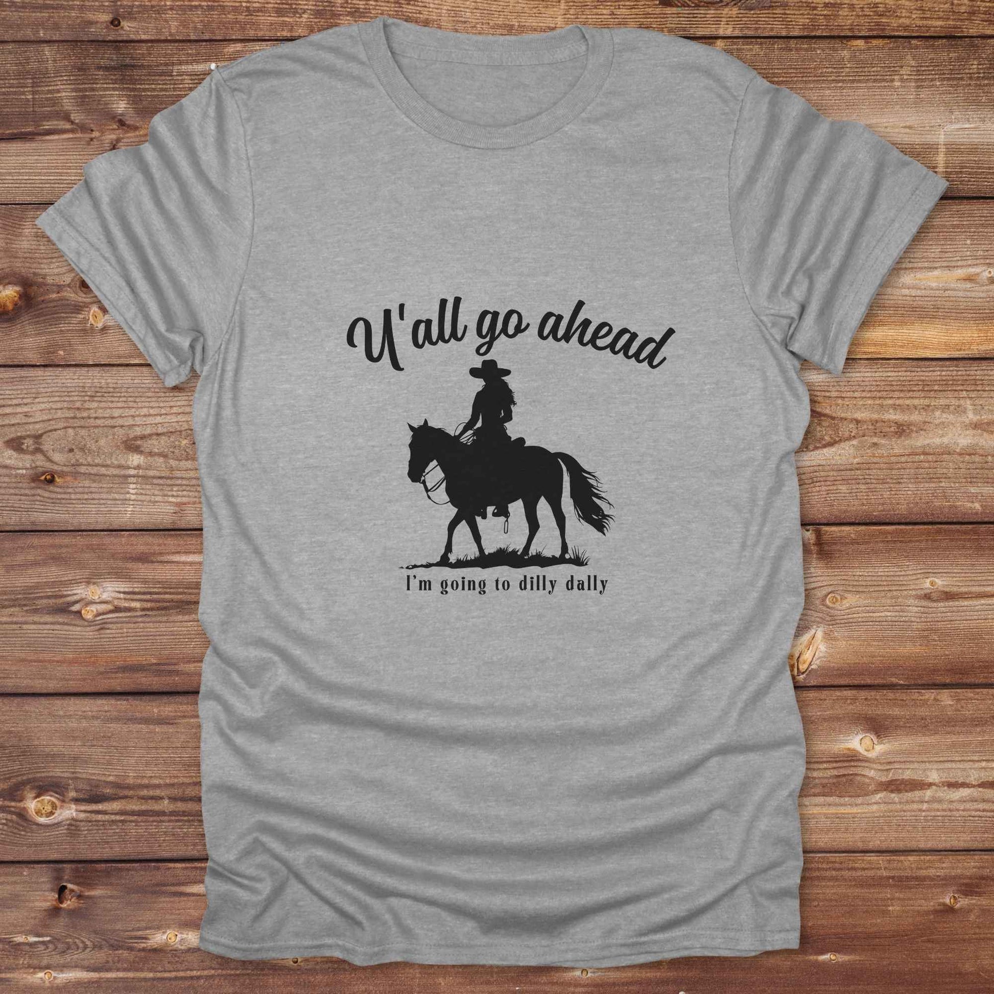 Fun western t-shirt for horse lovers and cowgirls. Western cowgirl graphic tee with horse design. Cowboy humor t-shirt for rodeo and country lovers. Horse lover funny t-shirt with western theme. Country style horse graphic tee for cowboys and cowgirls. Retro style funny western shirt for equestrians. Cute and funny country shirt with horse print. Southern cowgirl funny quote shirt for horse lovers. If Y'all go ahead.