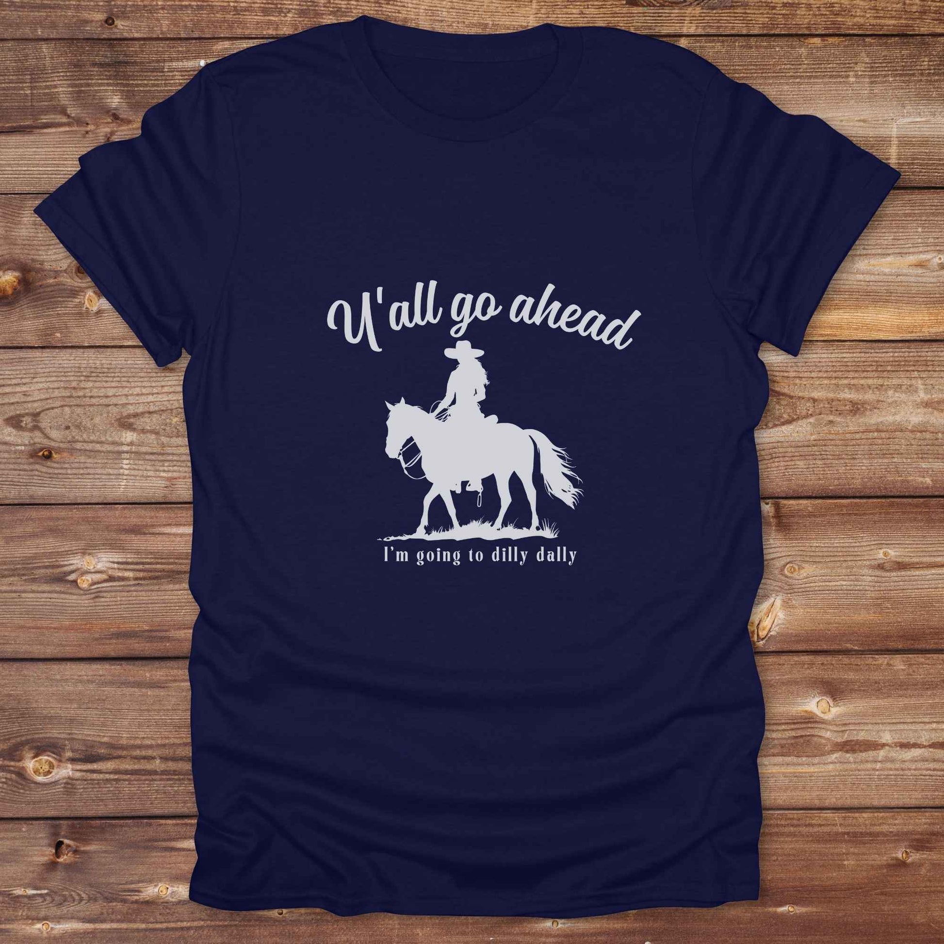 Fun western t-shirt for horse lovers and cowgirls. Western cowgirl graphic tee with horse design. Cowboy humor t-shirt for rodeo and country lovers. Horse lover funny t-shirt with western theme. Country style horse graphic tee for cowboys and cowgirls. Retro style funny western shirt for equestrians. Cute and funny country shirt with horse print. Southern cowgirl funny quote shirt for horse lovers. If Y'all go ahead.