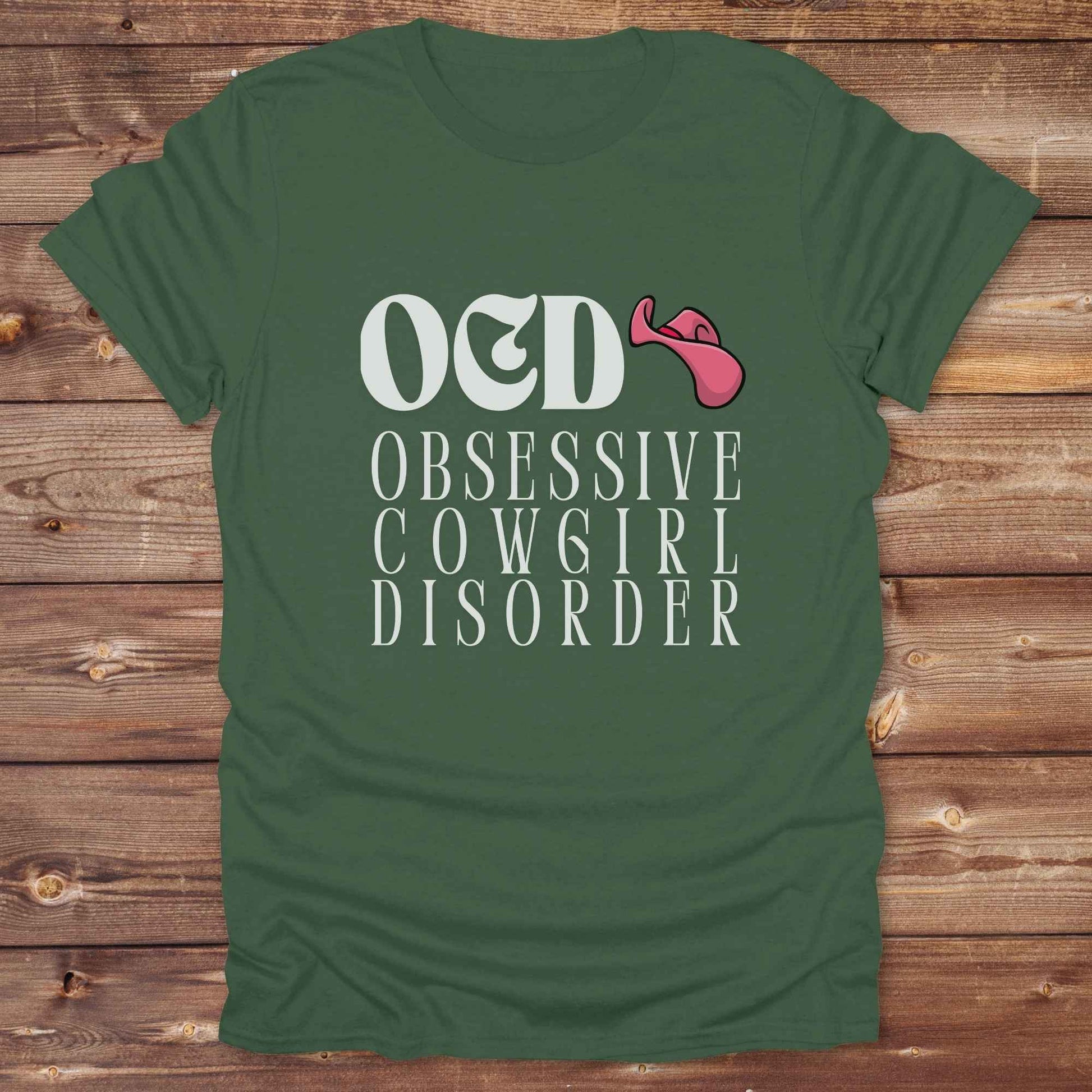 Fun western t-shirt for horse lovers and cowgirls. Western cowgirl graphic tee with horse design. Cowboy humor t-shirt for rodeo and country lovers. Horse lover funny t-shirt with western theme. Country style horse graphic tee for cowboys and cowgirls. Retro style funny western shirt for equestrians. Cute and funny country shirt with horse print. Southern cowgirl funny quote shirt for horse lovers. OCD Cowgirl.