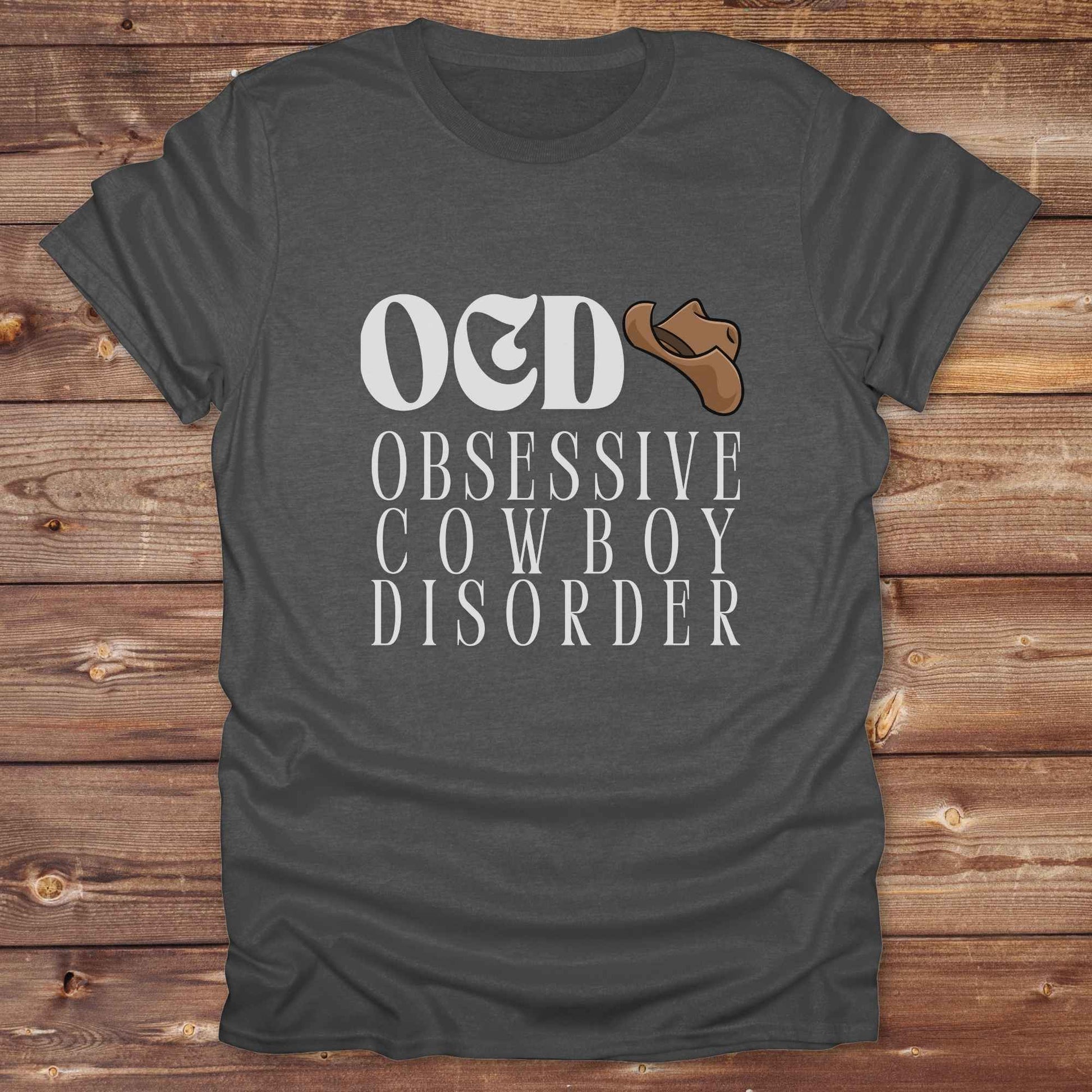 Fun western t-shirt for horse lovers and cowgirls. Western cowgirl graphic tee with horse design. Cowboy humor t-shirt for rodeo and country lovers. Horse lover funny t-shirt with western theme. Country style horse graphic tee for cowboys and cowgirls. Retro style funny western shirt for equestrians. Cute and funny country shirt with horse print. Southern cowgirl funny quote shirt for horse lovers. OCD Cowboy.