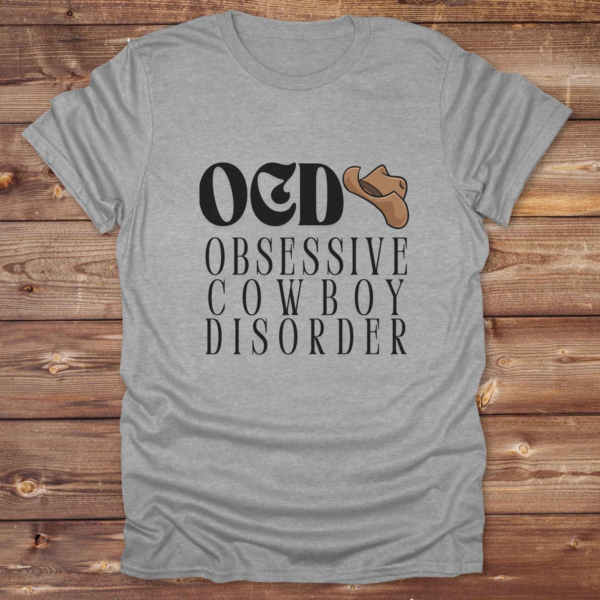 Fun western t-shirt for horse lovers and cowgirls. Western cowgirl graphic tee with horse design. Cowboy humor t-shirt for rodeo and country lovers. Horse lover funny t-shirt with western theme. Country style horse graphic tee for cowboys and cowgirls. Retro style funny western shirt for equestrians. Cute and funny country shirt with horse print. Southern cowgirl funny quote shirt for horse lovers. OCD Cowboy.