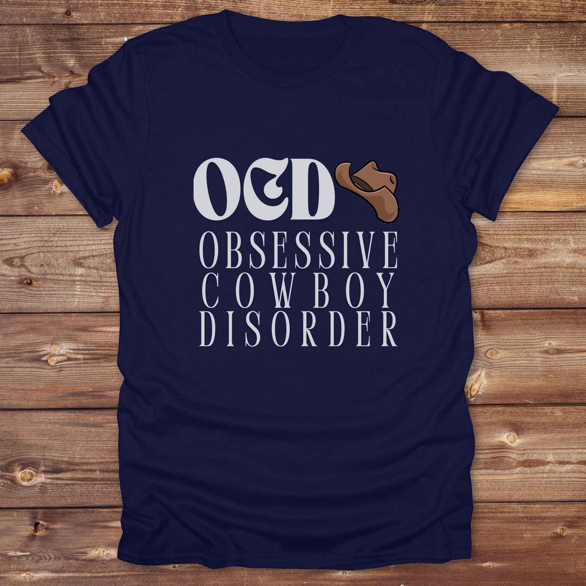 Fun western t-shirt for horse lovers and cowgirls. Western cowgirl graphic tee with horse design. Cowboy humor t-shirt for rodeo and country lovers. Horse lover funny t-shirt with western theme. Country style horse graphic tee for cowboys and cowgirls. Retro style funny western shirt for equestrians. Cute and funny country shirt with horse print. Southern cowgirl funny quote shirt for horse lovers. OCD Cowboy.