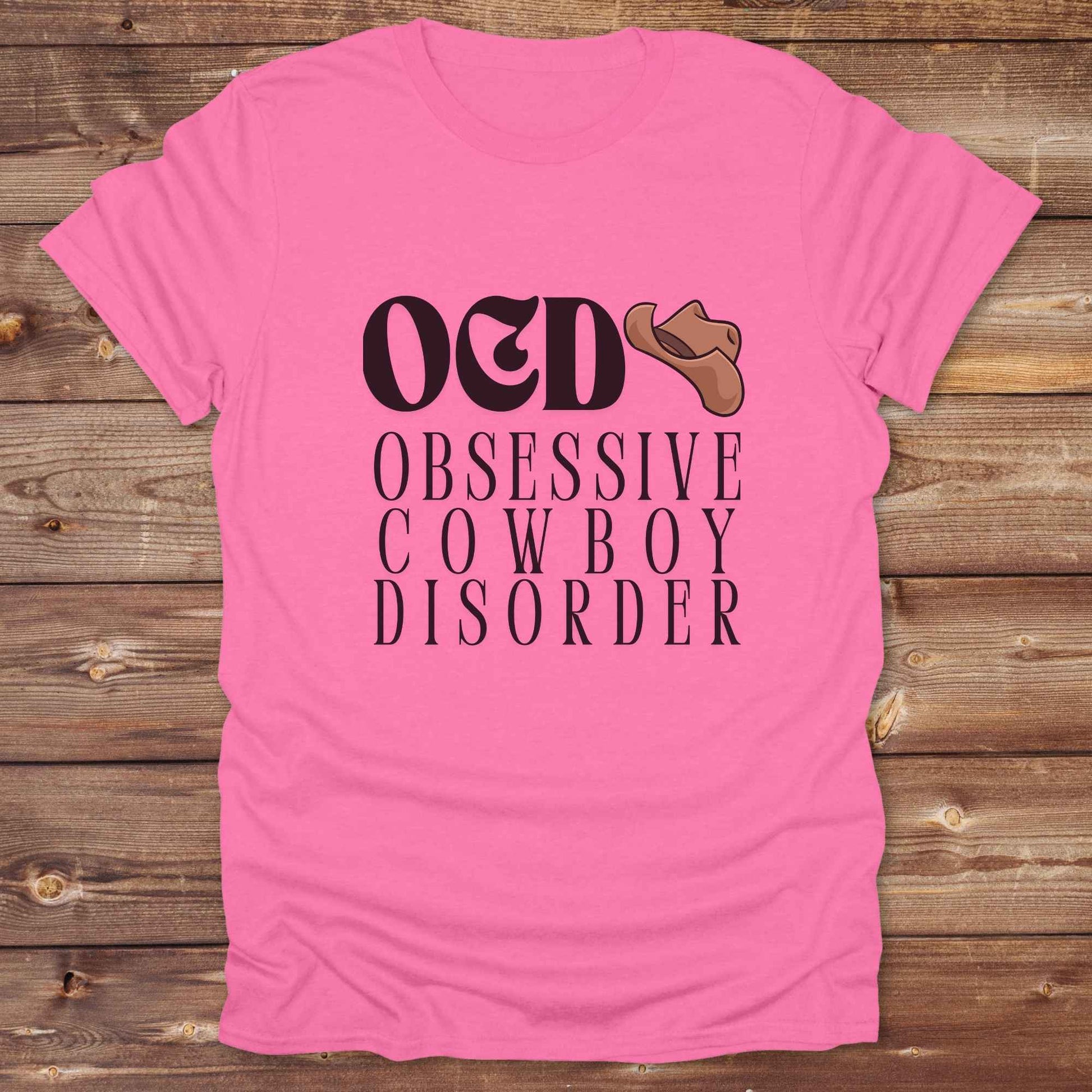 Fun western t-shirt for horse lovers and cowgirls. Western cowgirl graphic tee with horse design. Cowboy humor t-shirt for rodeo and country lovers. Horse lover funny t-shirt with western theme. Country style horse graphic tee for cowboys and cowgirls. Retro style funny western shirt for equestrians. Cute and funny country shirt with horse print. Southern cowgirl funny quote shirt for horse lovers. OCD Cowboy.