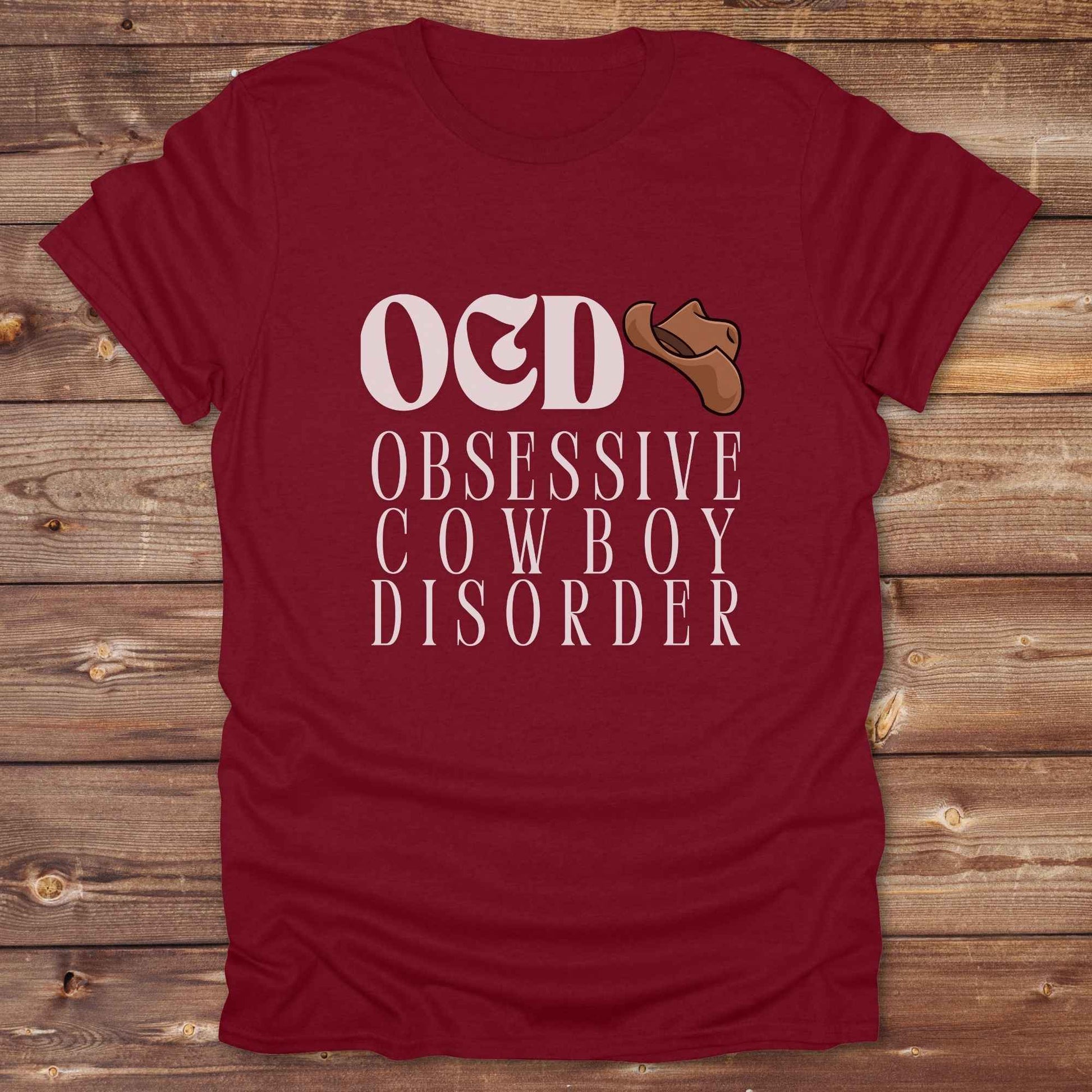 Fun western t-shirt for horse lovers and cowgirls. Western cowgirl graphic tee with horse design. Cowboy humor t-shirt for rodeo and country lovers. Horse lover funny t-shirt with western theme. Country style horse graphic tee for cowboys and cowgirls. Retro style funny western shirt for equestrians. Cute and funny country shirt with horse print. Southern cowgirl funny quote shirt for horse lovers. OCD Cowboy.