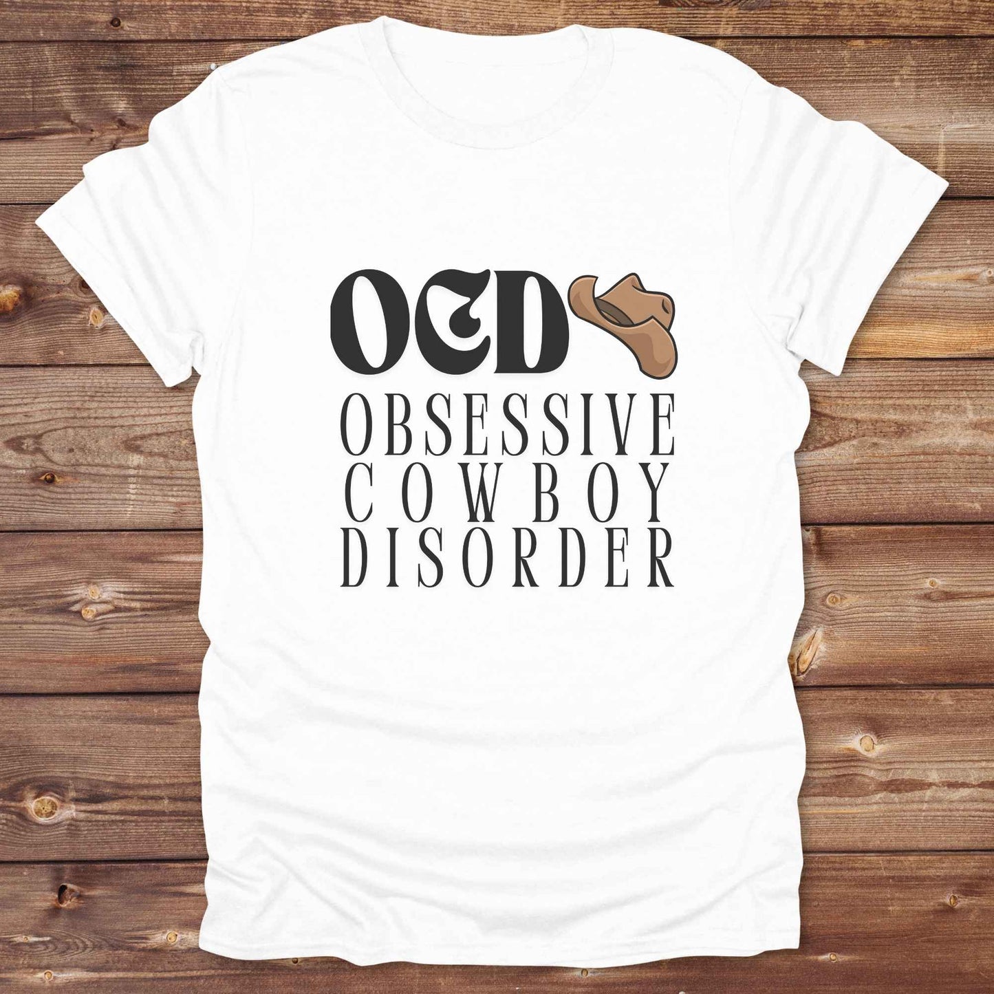 Fun western t-shirt for horse lovers and cowgirls. Western cowgirl graphic tee with horse design. Cowboy humor t-shirt for rodeo and country lovers. Horse lover funny t-shirt with western theme. Country style horse graphic tee for cowboys and cowgirls. Retro style funny western shirt for equestrians. Cute and funny country shirt with horse print. Southern cowgirl funny quote shirt for horse lovers. OCD Cowboy.