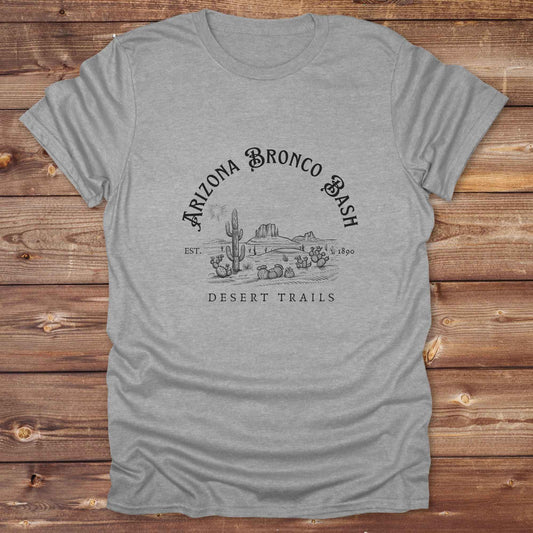 Fun western t-shirt featuring horse themed design for cowgirls, cowboys, horse lovers and equestrians, perfect for rodeo lovers, rustic style fans, and horse people. Unique graphic tee by Lasso and Loom. Arizona Bronco Bash Desert Trails.