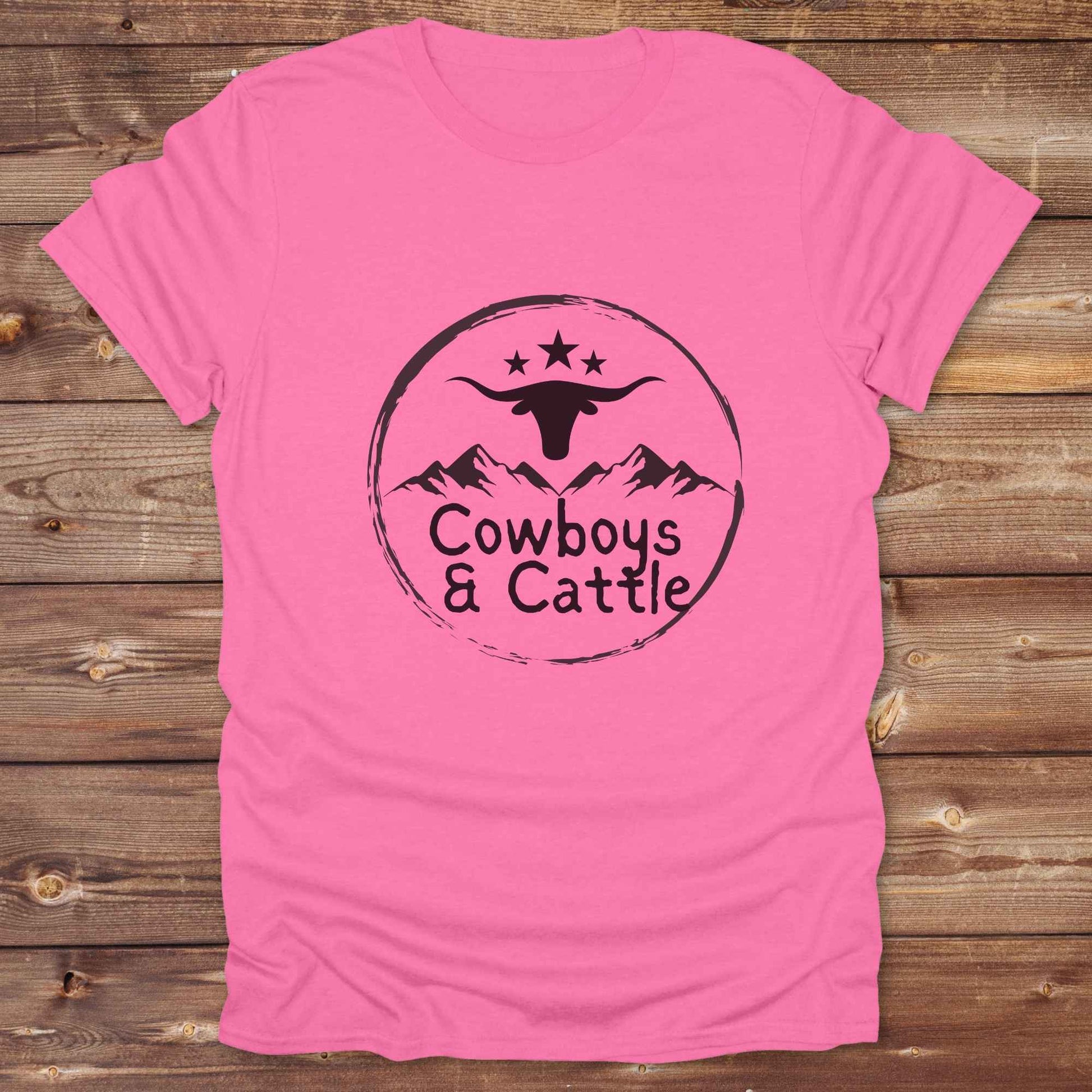 Fun western t-shirt featuring horse themed design for cowgirls, cowboys, horse lovers and equestrians, perfect for rodeo lovers, rustic style fans, and horse people. Unique graphic tee by Lasso and Loom.  Cowboys and cattle with mountain range and longhorn skull.