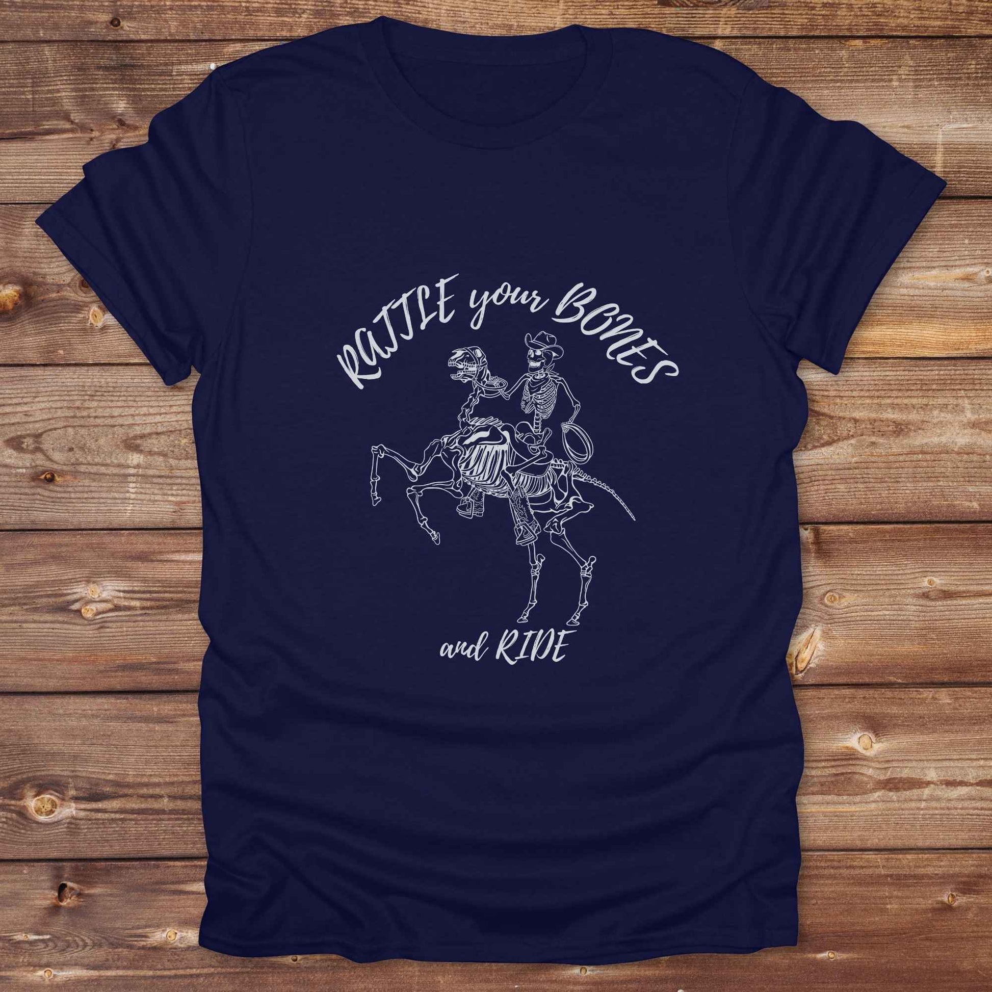 Fun western t-shirt featuring horse themed design for cowgirls, cowboys, horse lovers and equestrians, perfect for rodeo lovers, rustic style fans, and horse people. Unique graphic tee by Lasso and Loom.  Rattle your bones and ride.