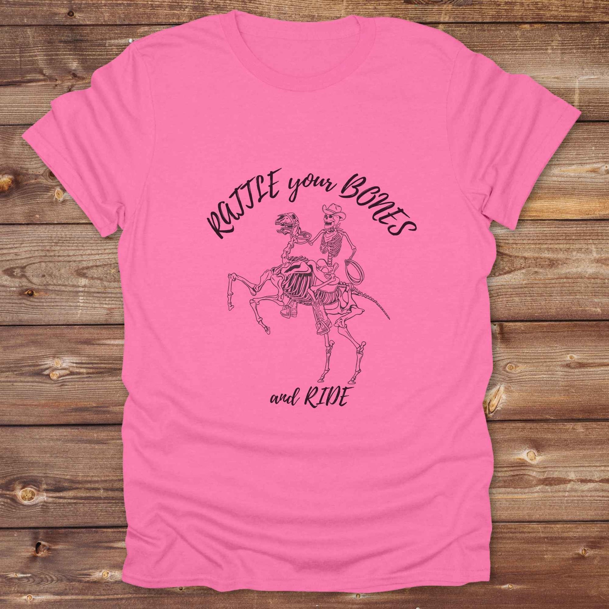 Fun western t-shirt featuring horse themed design for cowgirls, cowboys, horse lovers and equestrians, perfect for rodeo lovers, rustic style fans, and horse people. Unique graphic tee by Lasso and Loom.  Rattle your bones and ride.
