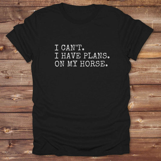 Fun western t-shirt featuring horse themed design for cowgirls, cowboys, horse lovers and equestrians, perfect for rodeo lovers, rustic style fans, and horse people. Unique graphic tee by Lasso and Loom.  I Can't I have plans.