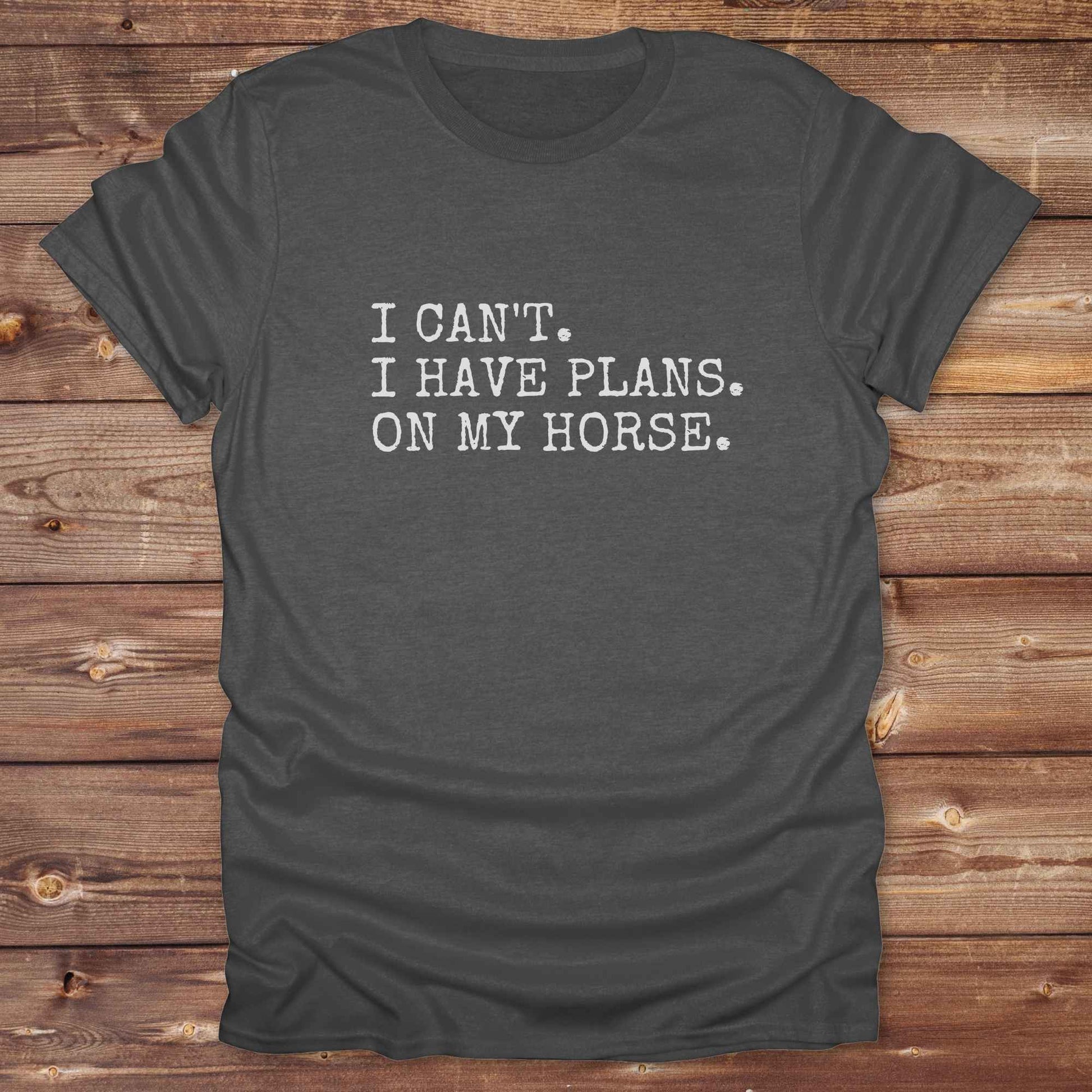 Fun western t-shirt featuring horse themed design for cowgirls, cowboys, horse lovers and equestrians, perfect for rodeo lovers, rustic style fans, and horse people. Unique graphic tee by Lasso and Loom.  I Can't I have plans.