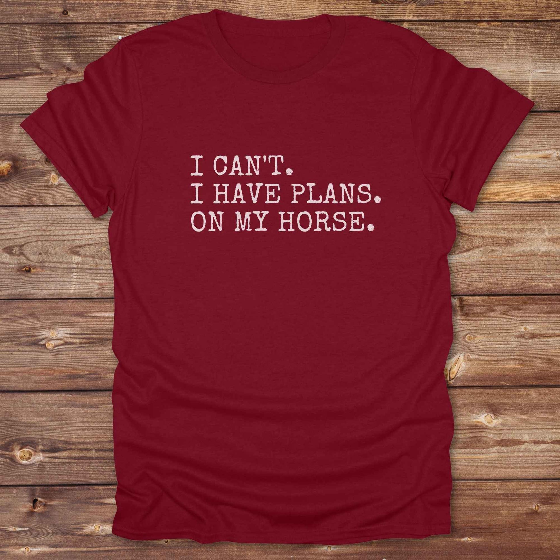 Fun western t-shirt featuring horse themed design for cowgirls, cowboys, horse lovers and equestrians, perfect for rodeo lovers, rustic style fans, and horse people. Unique graphic tee by Lasso and Loom.  I Can't I have plans.