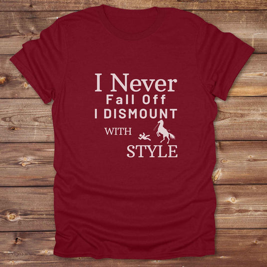 Fun western t-shirt featuring horse themed design for cowgirls, cowboys, horse lovers and equestrians, perfect for rodeo lovers, rustic style fans, and horse people. Unique graphic tee by Lasso and Loom.  I never fall off I dismount in style.