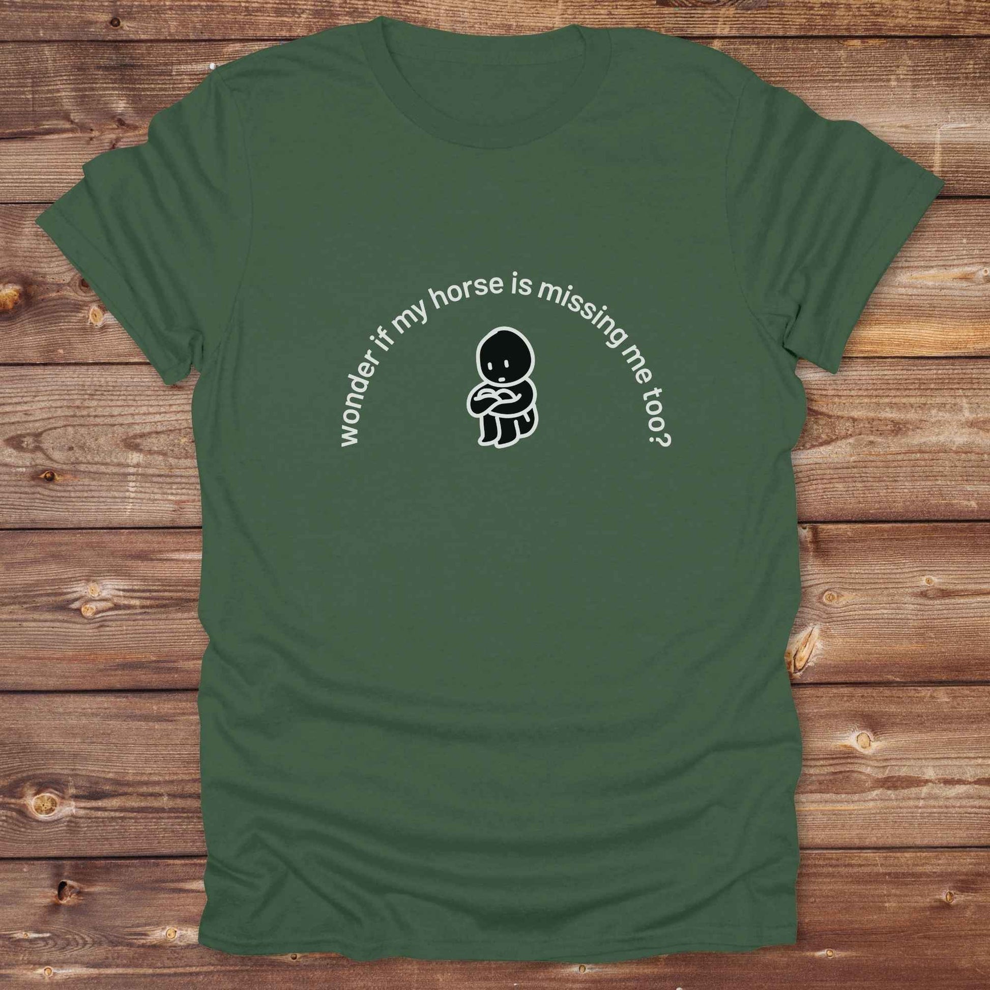 Fun western t-shirt featuring horse themed design for cowgirls, cowboys, horse lovers and equestrians, perfect for rodeo lovers, rustic style fans, and horse people. Unique graphic tee by Lasso and Loom.  Wonder if my horse is missing me too.