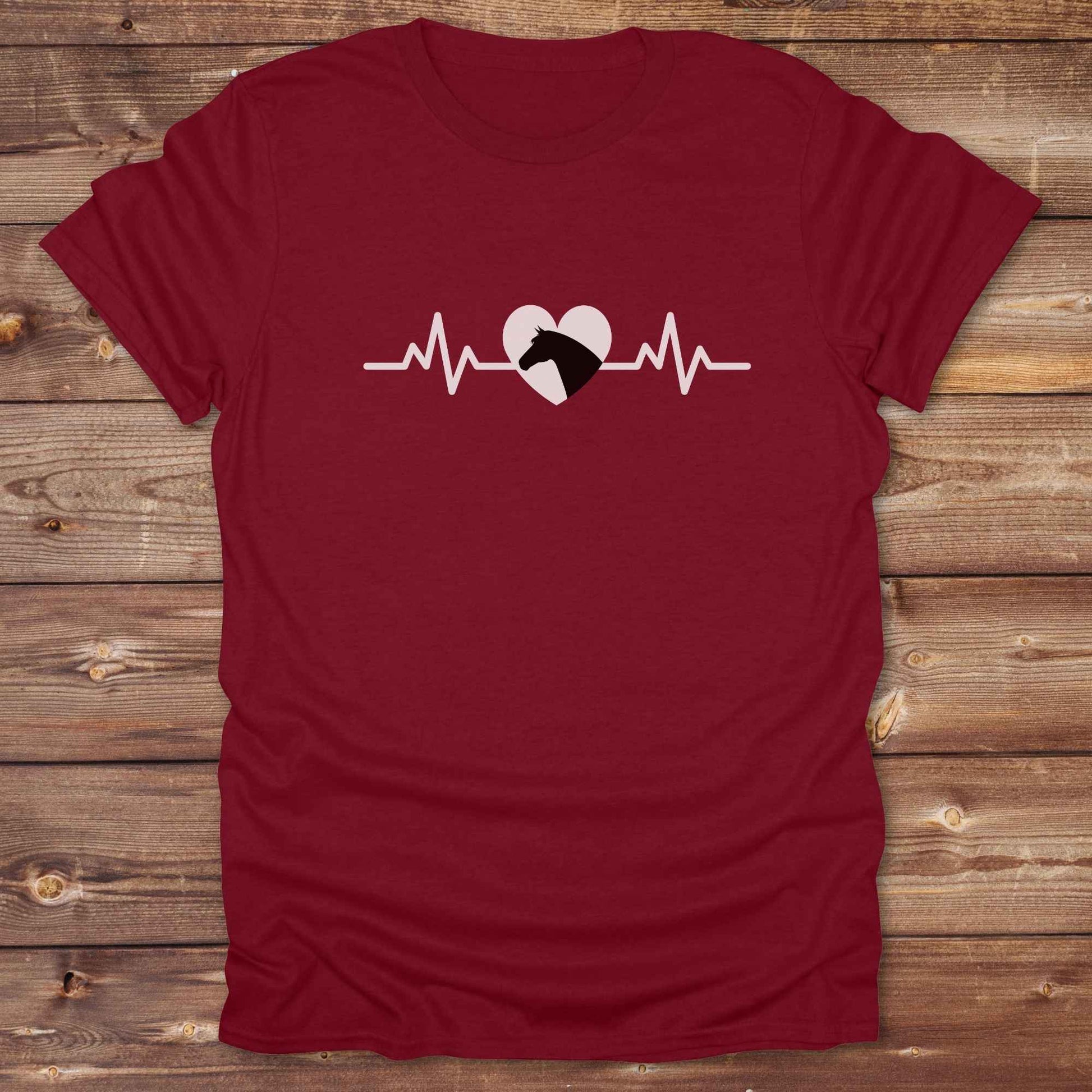 Fun western t-shirt featuring horse themed design for cowgirls, cowboys, horse lovers and equestrians, perfect for rodeo lovers, rustic style fans, and horse people. Unique graphic tee by Lasso and Loom. Heartbeat with a horse in black.