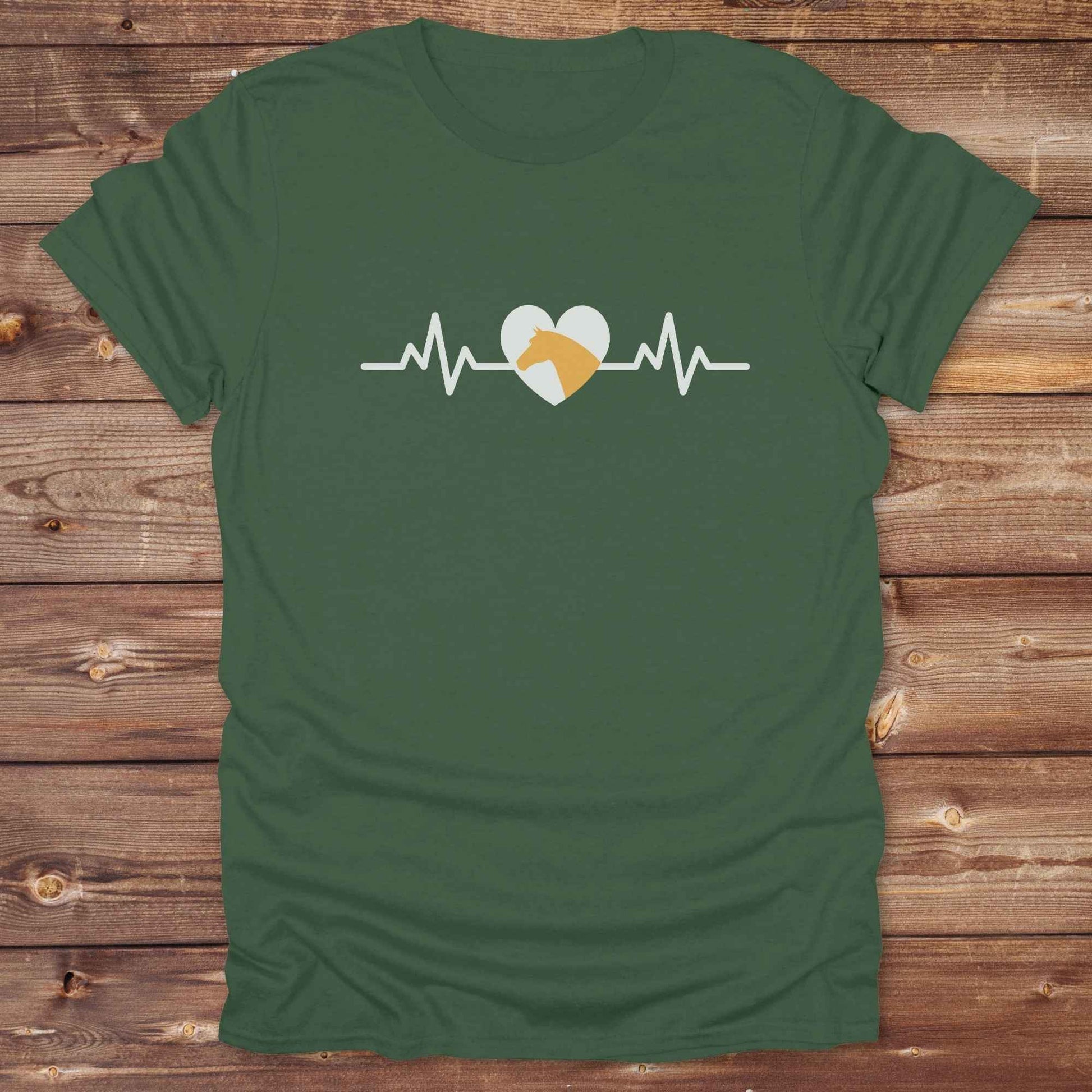 Fun western t-shirt featuring horse themed design for cowgirls, cowboys, horse lovers and equestrians, perfect for rodeo lovers, rustic style fans, and horse people. Unique graphic tee by Lasso and Loom. Heartbeat with a horse in orange.