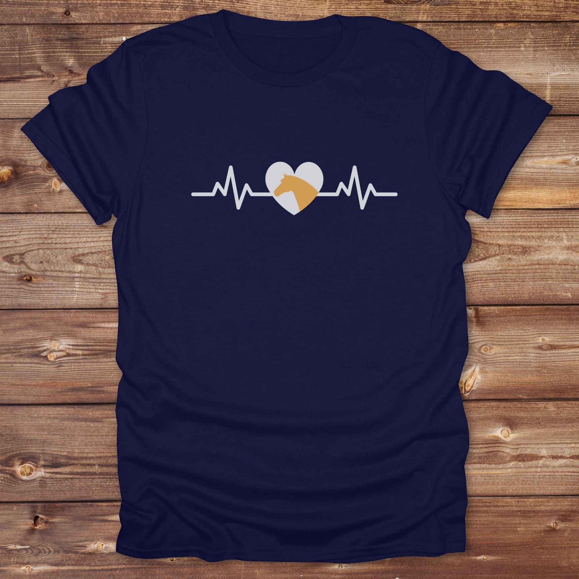 Fun western t-shirt featuring horse themed design for cowgirls, cowboys, horse lovers and equestrians, perfect for rodeo lovers, rustic style fans, and horse people. Unique graphic tee by Lasso and Loom. Heartbeat with a horse in orange.