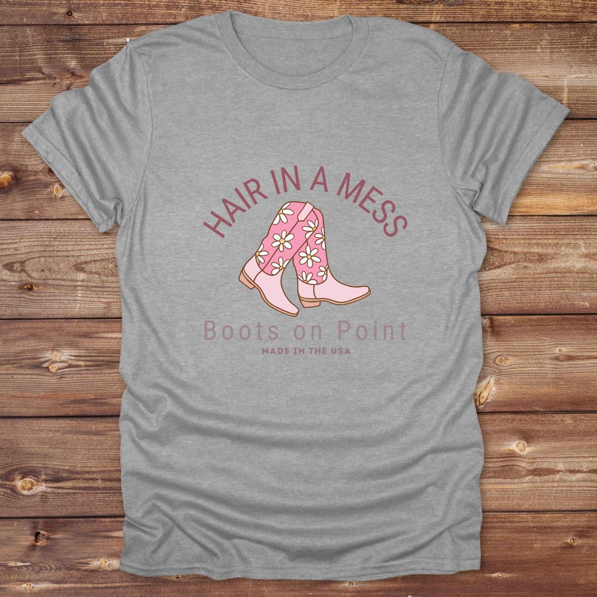 Fun western t-shirt featuring horse themed design for cowgirls, cowboys, horse lovers and equestrians, perfect for rodeo lovers, rustic style fans, and horse people. Unique graphic tee by Lasso and Loom. Hair in a Mess Boots on Point.