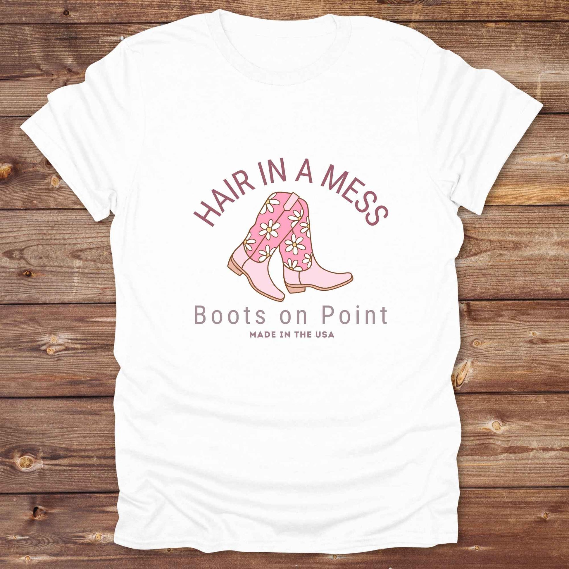 Fun western t-shirt featuring horse themed design for cowgirls, cowboys, horse lovers and equestrians, perfect for rodeo lovers, rustic style fans, and horse people. Unique graphic tee by Lasso and Loom. Hair in a Mess Boots on Point.