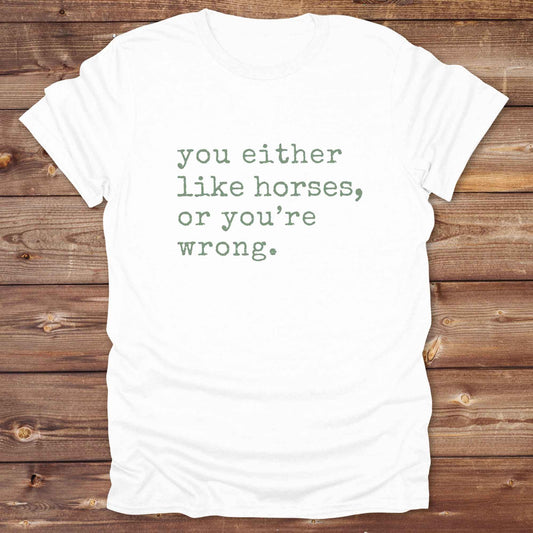 Show your love for horses loud and proud with this funny typography western tee ,perfect for cowgirls, ranchers, and equestrians. 
This “You either like horses or you're wrong” t-shirt is a hilarious must have for horse lovers with sass and sarcasm. Ideal gift for any horse girl or cowboy, this rustic western Gildan tee blends humor with horse life perfectly. Whether you’re mucking stalls or riding trails, this sarcastic horse lover tee is a funny go-to favorite.