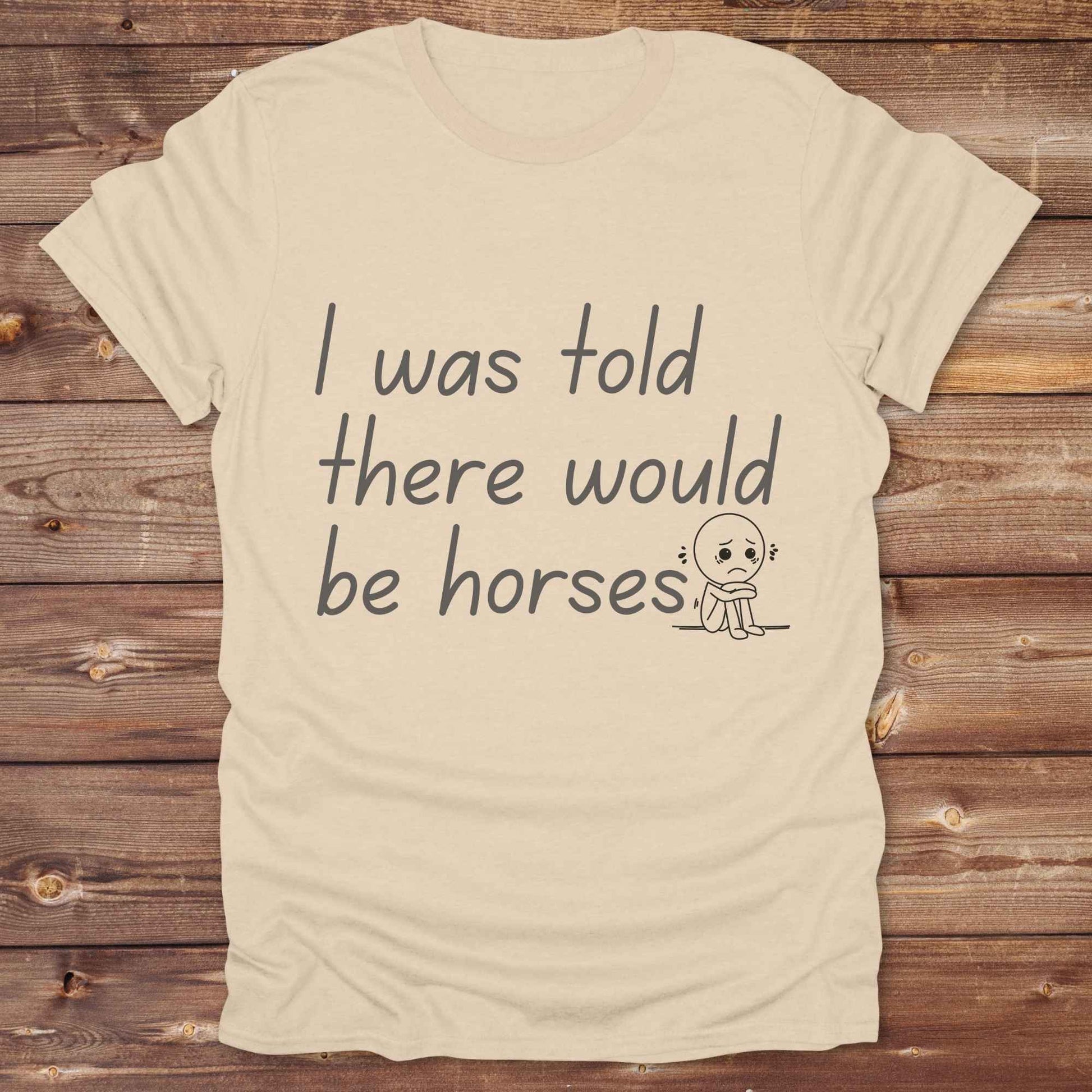 "I Was Told There Would Be Horses” t-shirt blends western humor with country sarcasm, making it a perfect gift for horse lovers, cowboys, and cowgirls alike. It features a bold quote and a sad cartoon face, adding personality and rustic charm to your cowboy core wardrobe. Whether you're headed to a rodeo, riding event, country fair, or just living that barn life, this shirt brings the laughs and the style. It’s a great birthday gift, rodeo tee, or daily wear.