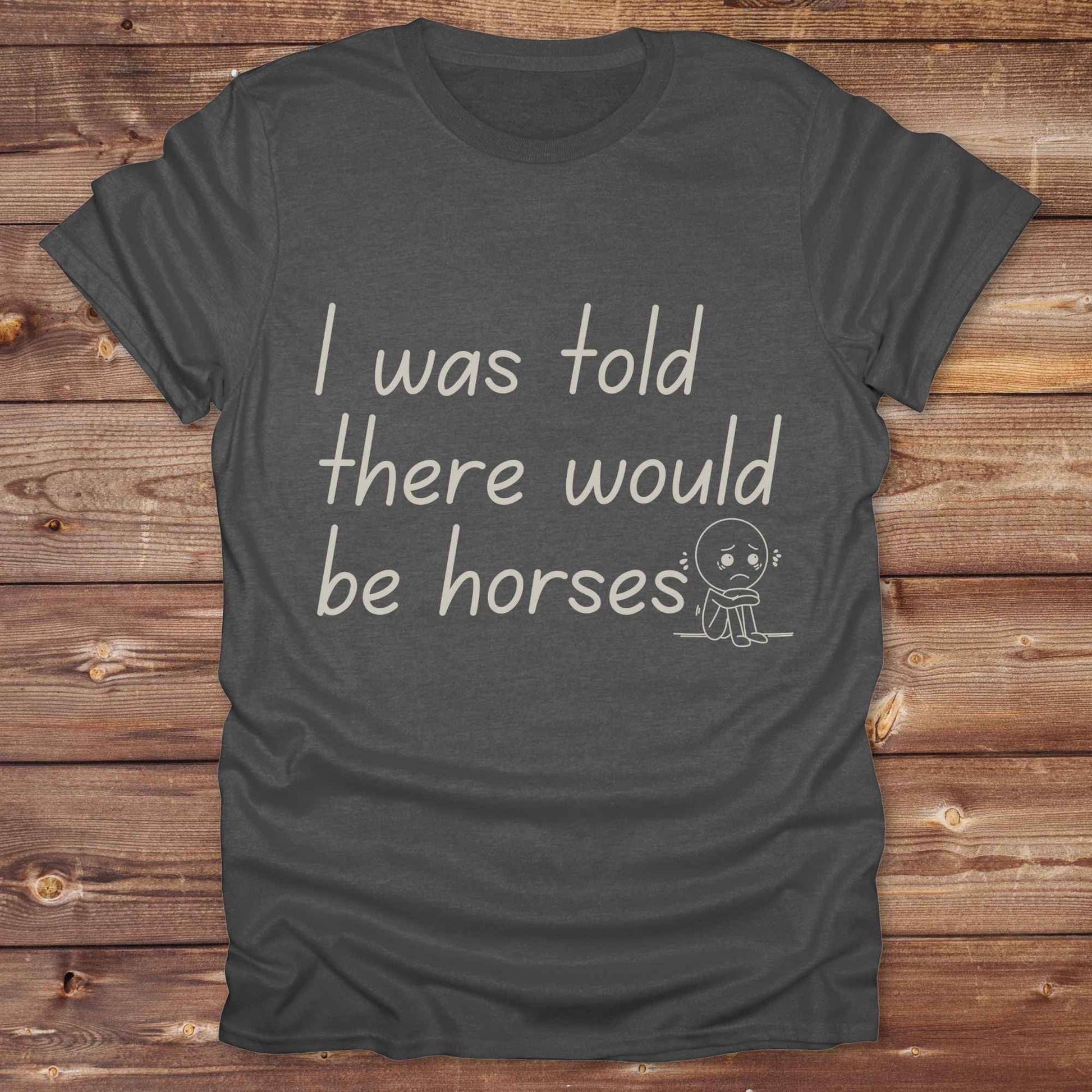 "I Was Told There Would Be Horses” t-shirt blends western humor with country sarcasm, making it a perfect gift for horse lovers, cowboys, and cowgirls alike. It features a bold quote and a sad cartoon face, adding personality and rustic charm to your cowboy core wardrobe. Whether you're headed to a rodeo, riding event, country fair, or just living that barn life, this shirt brings the laughs and the style. It’s a great birthday gift, rodeo tee, or daily wear.
