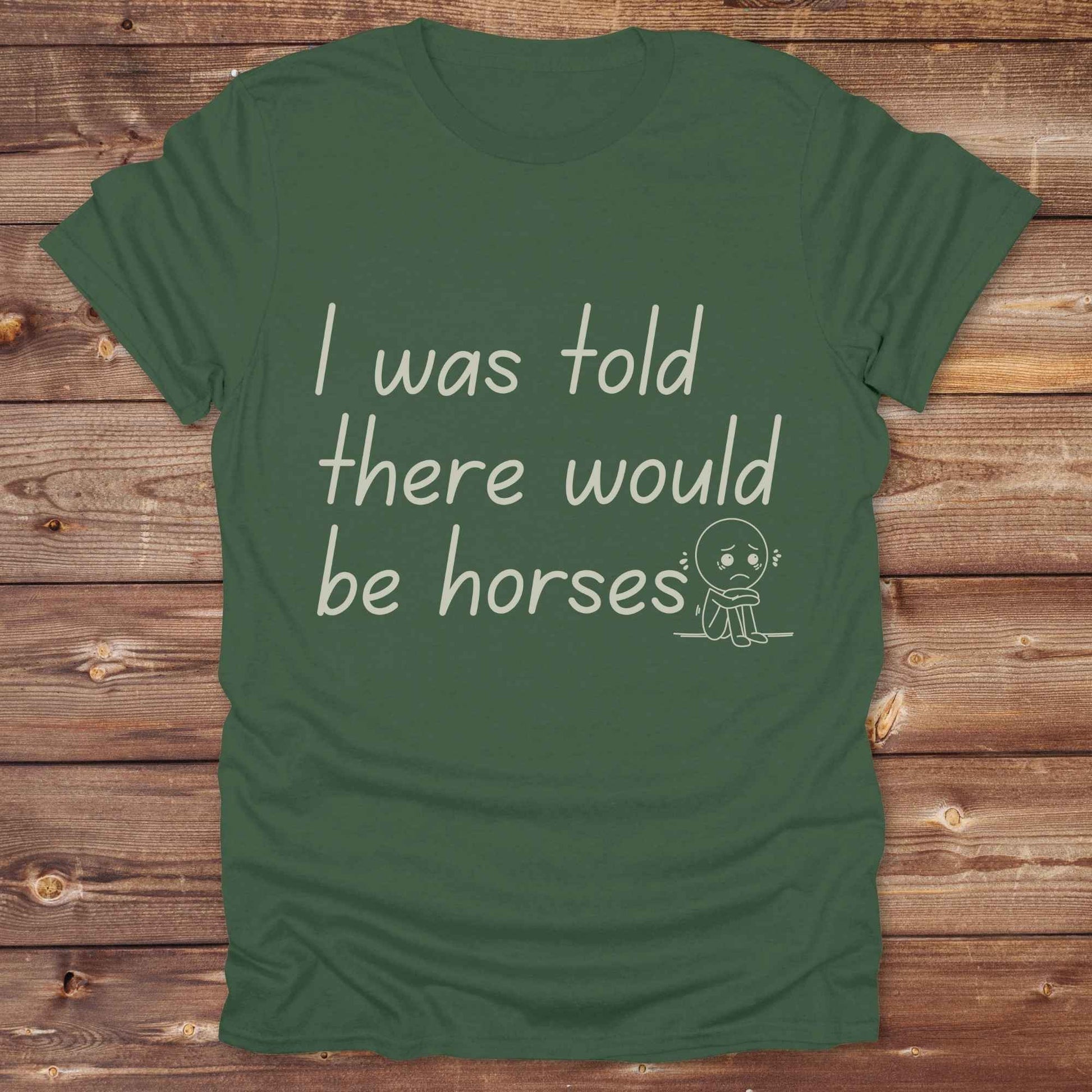 "I Was Told There Would Be Horses” t-shirt blends western humor with country sarcasm, making it a perfect gift for horse lovers, cowboys, and cowgirls alike. It features a bold quote and a sad cartoon face, adding personality and rustic charm to your cowboy core wardrobe. Whether you're headed to a rodeo, riding event, country fair, or just living that barn life, this shirt brings the laughs and the style. It’s a great birthday gift, rodeo tee, or daily wear.