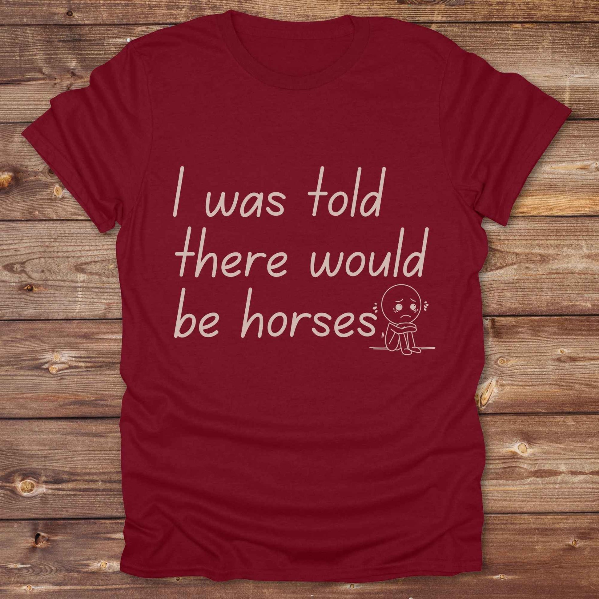"I Was Told There Would Be Horses” t-shirt blends western humor with country sarcasm, making it a perfect gift for horse lovers, cowboys, and cowgirls alike. It features a bold quote and a sad cartoon face, adding personality and rustic charm to your cowboy core wardrobe. Whether you're headed to a rodeo, riding event, country fair, or just living that barn life, this shirt brings the laughs and the style. It’s a great birthday gift, rodeo tee, or daily wear.