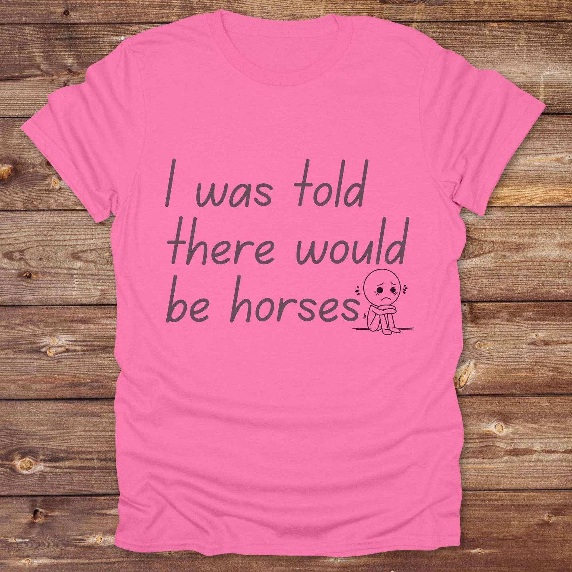 "I Was Told There Would Be Horses” t-shirt blends western humor with country sarcasm, making it a perfect gift for horse lovers, cowboys, and cowgirls alike. It features a bold quote and a sad cartoon face, adding personality and rustic charm to your cowboy core wardrobe. Whether you're headed to a rodeo, riding event, country fair, or just living that barn life, this shirt brings the laughs and the style. It’s a great birthday gift, rodeo tee, or daily wear.