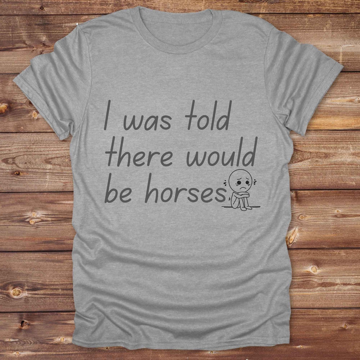 "I Was Told There Would Be Horses” t-shirt blends western humor with country sarcasm, making it a perfect gift for horse lovers, cowboys, and cowgirls alike. It features a bold quote and a sad cartoon face, adding personality and rustic charm to your cowboy core wardrobe. Whether you're headed to a rodeo, riding event, country fair, or just living that barn life, this shirt brings the laughs and the style. It’s a great birthday gift, rodeo tee, or daily wear.