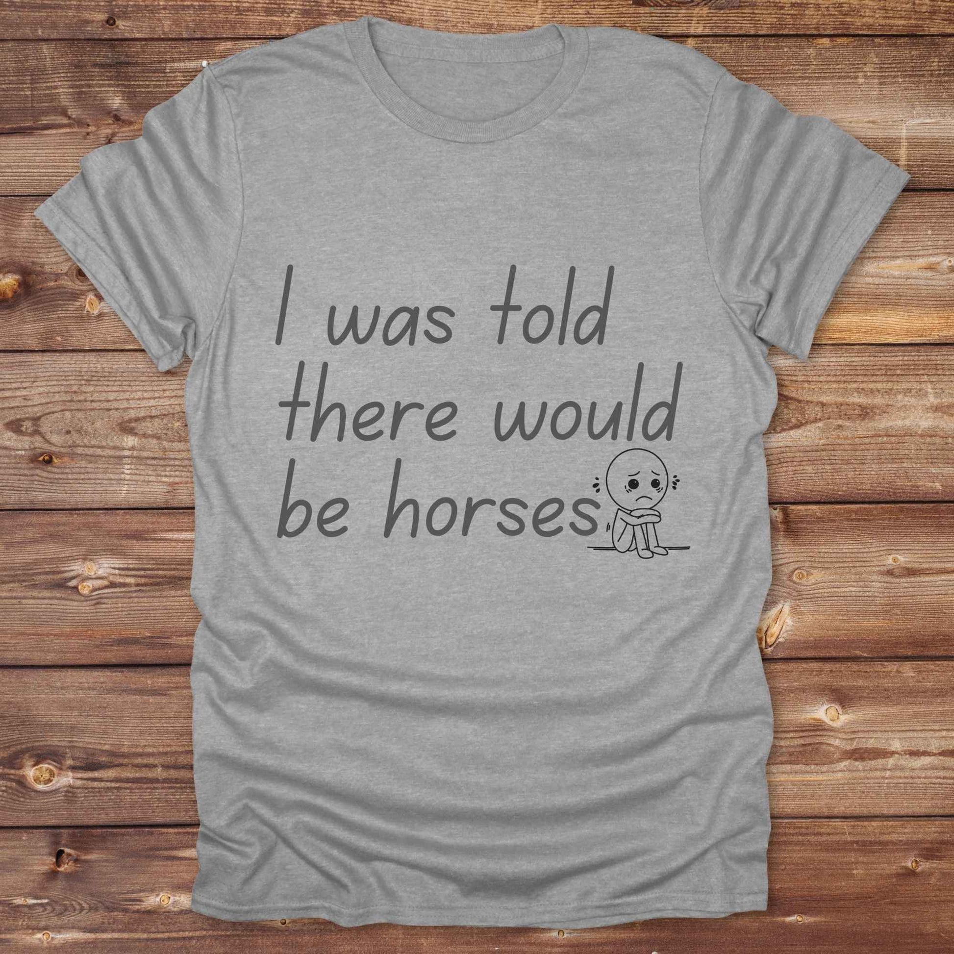 "I Was Told There Would Be Horses” t-shirt blends western humor with country sarcasm, making it a perfect gift for horse lovers, cowboys, and cowgirls alike. It features a bold quote and a sad cartoon face, adding personality and rustic charm to your cowboy core wardrobe. Whether you're headed to a rodeo, riding event, country fair, or just living that barn life, this shirt brings the laughs and the style. It’s a great birthday gift, rodeo tee, or daily wear.