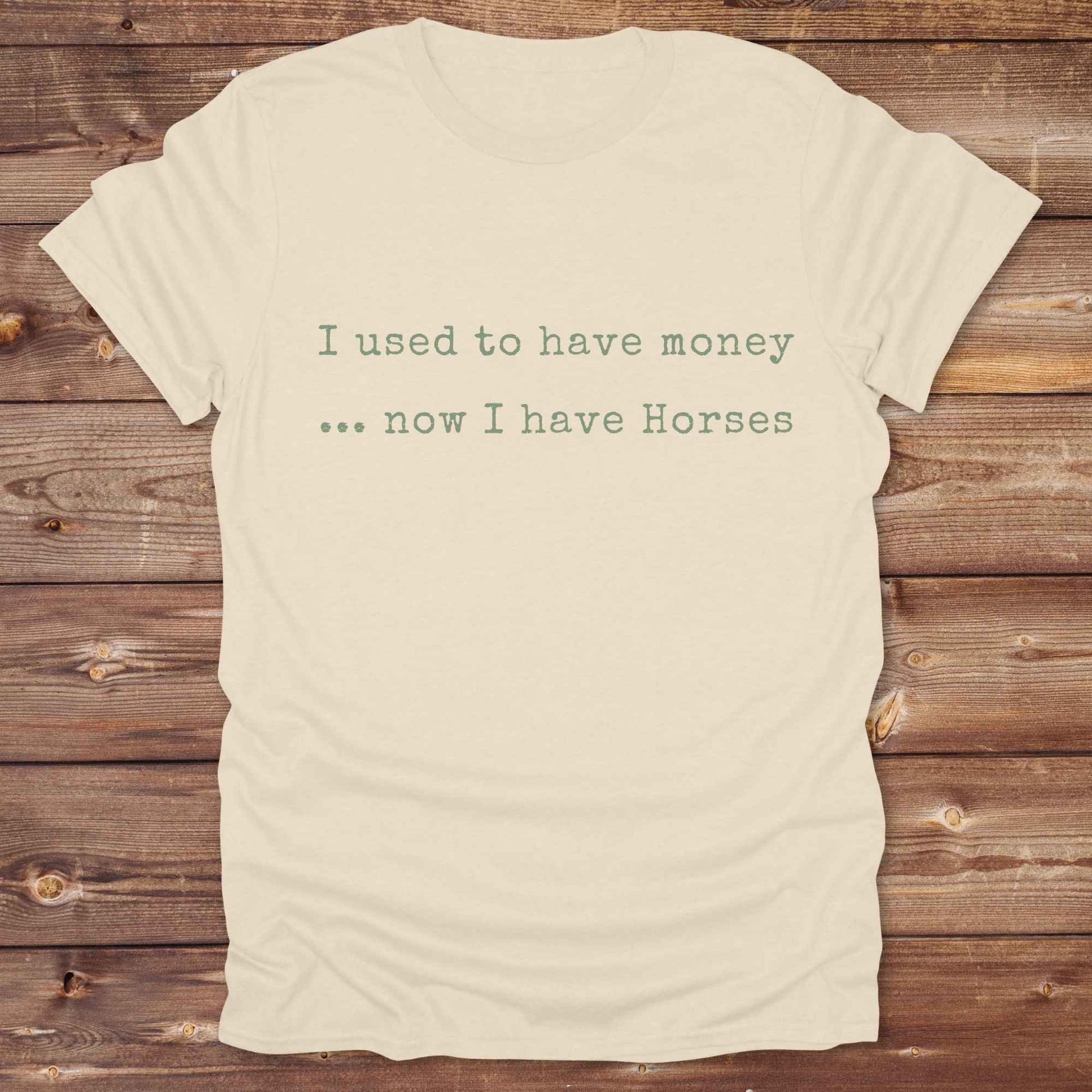 This “I Used to Have Money… Now I Have Horses” tee is made for cowgirls, cowboys, and equestrians who know the true cost of horse life and still love it. Perfect for barn days, rodeo weekends, or country fairs, this shirt brings horse humor to your everyday wardrobe. t’s a hilarious gift for horse lovers, horse moms, ranch workers, and anyone whose paycheck goes straight to hay.