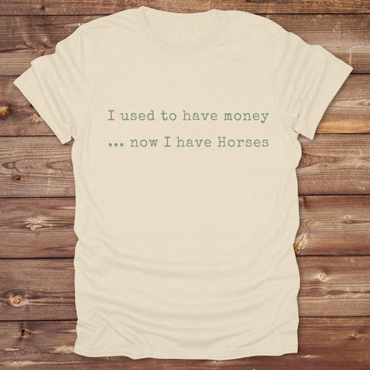 This “I Used to Have Money… Now I Have Horses” tee is made for cowgirls, cowboys, and equestrians who know the true cost of horse life and still love it. Perfect for barn days, rodeo weekends, or country fairs, this shirt brings horse humor to your everyday wardrobe. t’s a hilarious gift for horse lovers, horse moms, ranch workers, and anyone whose paycheck goes straight to hay.