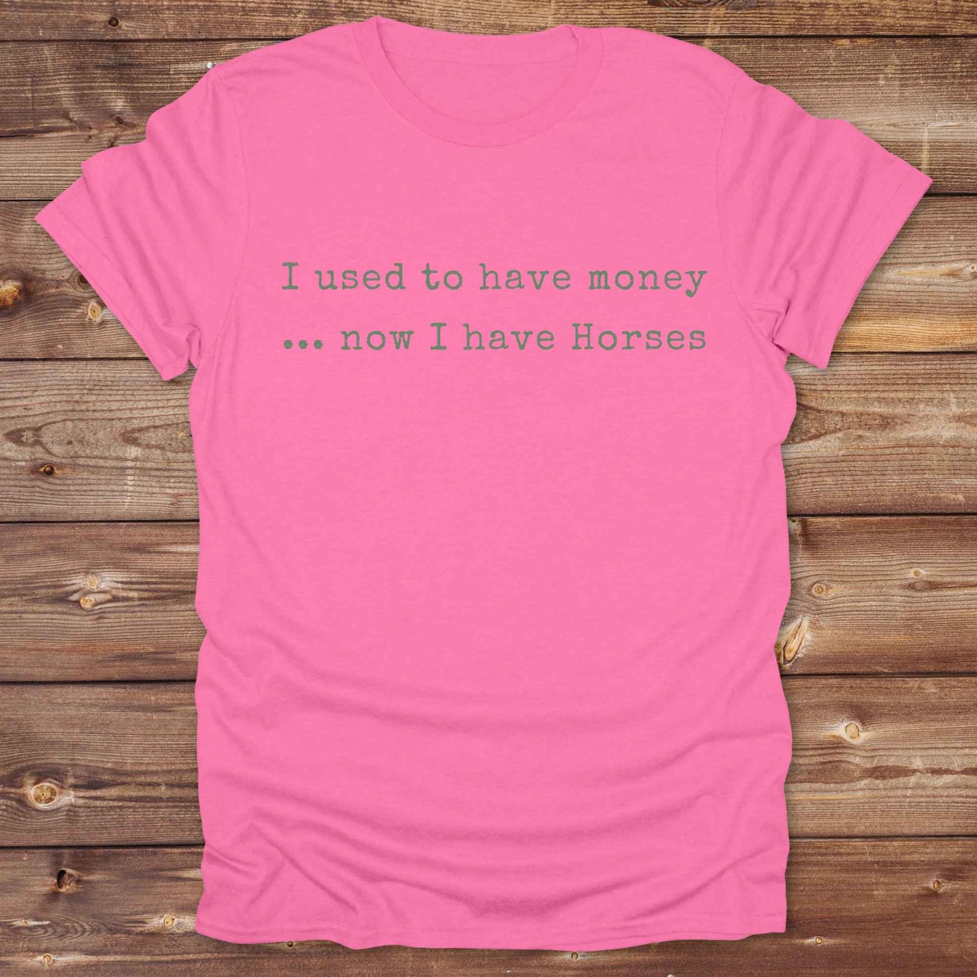 This “I Used to Have Money… Now I Have Horses” tee is made for cowgirls, cowboys, and equestrians who know the true cost of horse life and still love it. Perfect for barn days, rodeo weekends, or country fairs, this shirt brings horse humor to your everyday wardrobe. t’s a hilarious gift for horse lovers, horse moms, ranch workers, and anyone whose paycheck goes straight to hay.